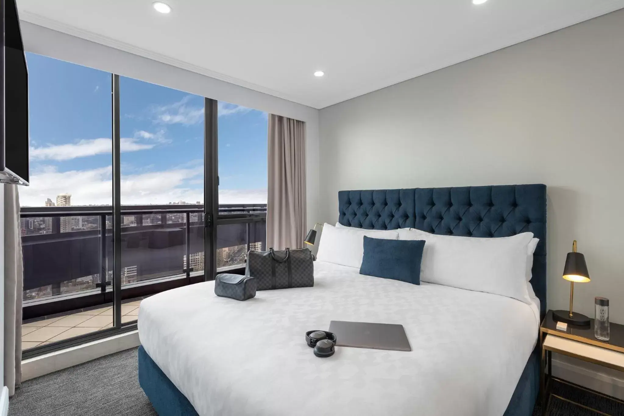 Bed in Meriton Suites Pitt Street, Sydney