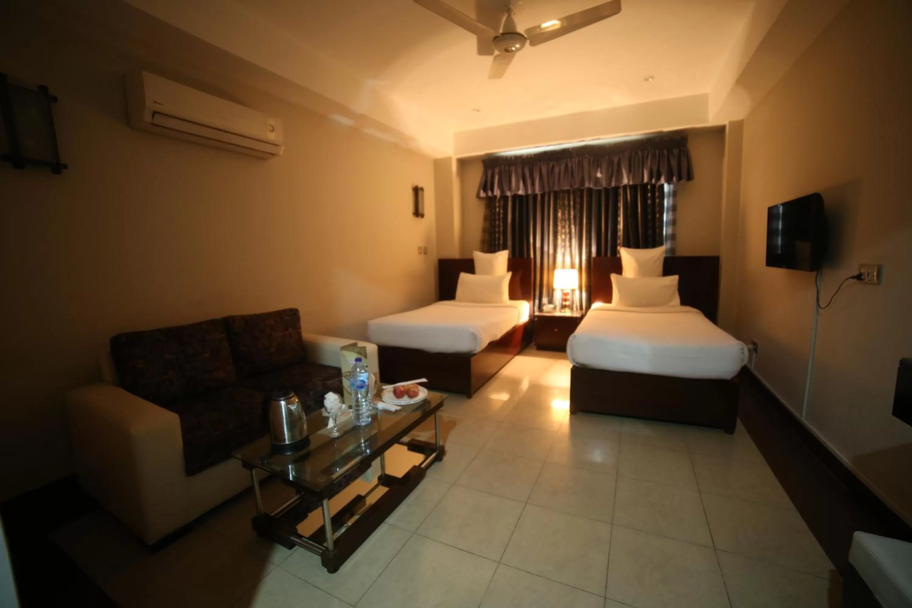 Bed in Hotel Multan Continental