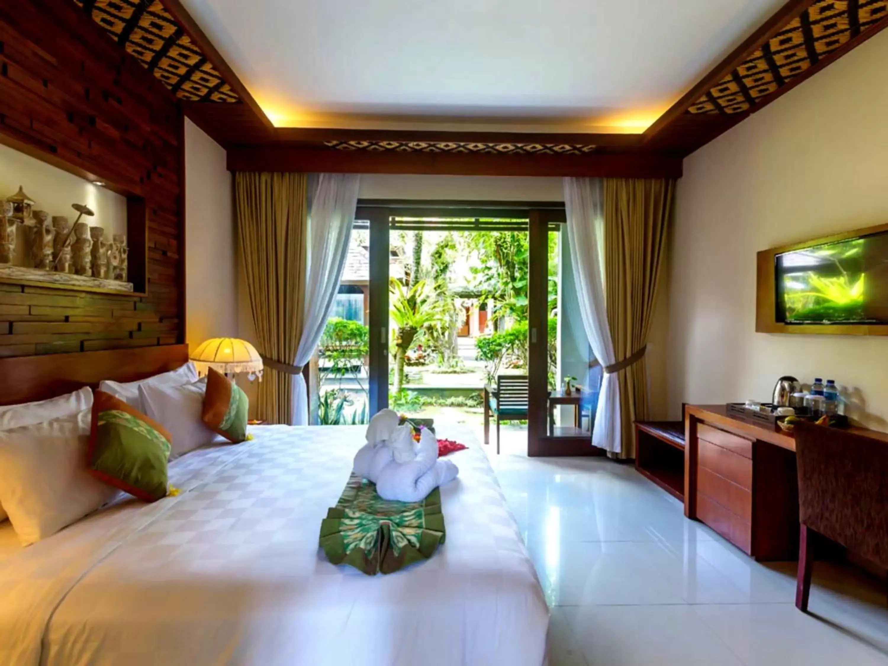 Bed in Awatara Boutique Resort Ubud