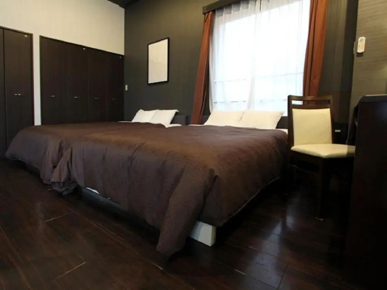 Bed in HOTEL LiVEMAX BUDGET Esaka