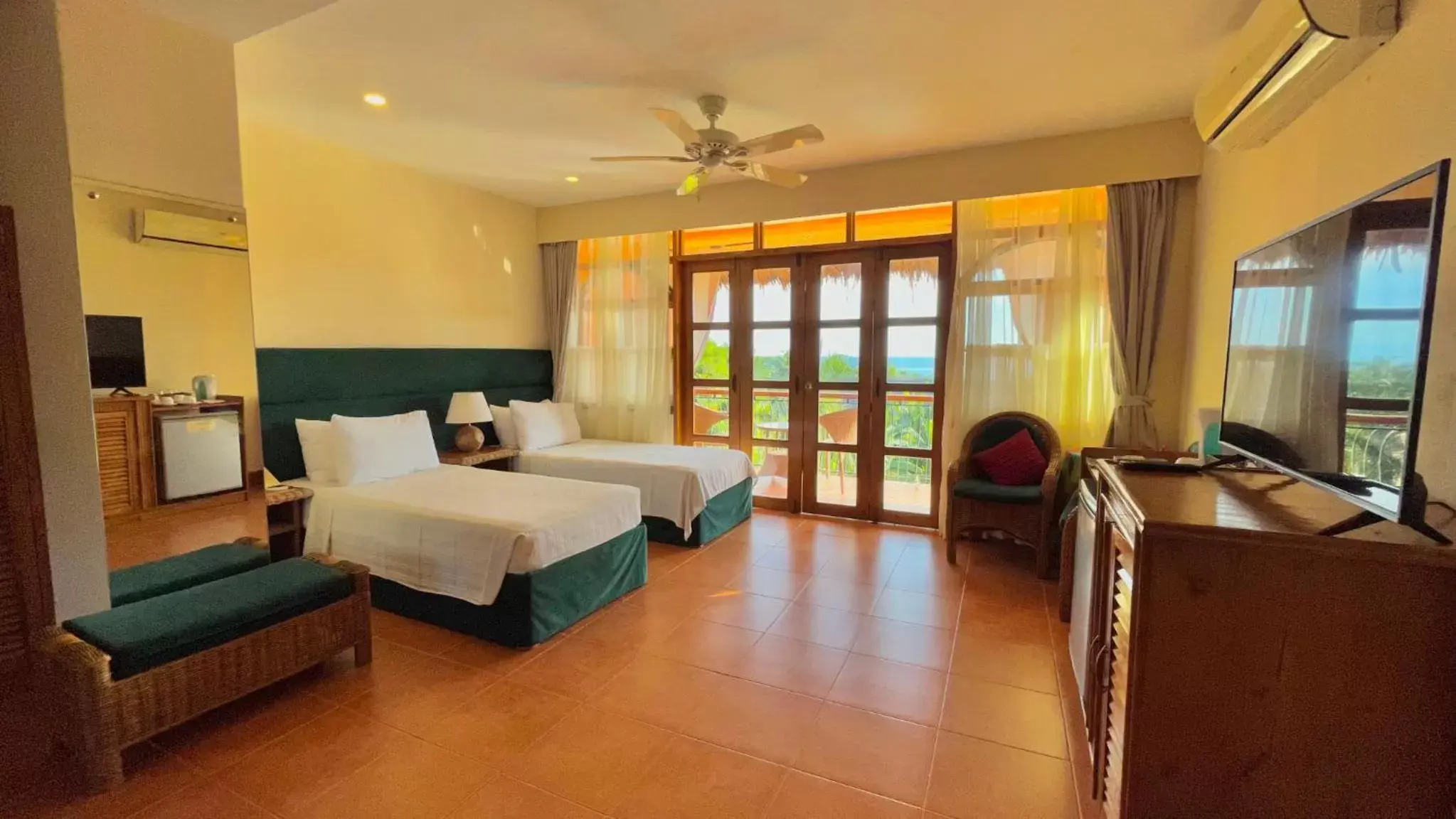 Photo of the whole room, Bed in Coco Grove Beach Resort, Siquijor Island Photo of the whole room, Bed in Coco Grove Beach Resort, Siquijor Island
