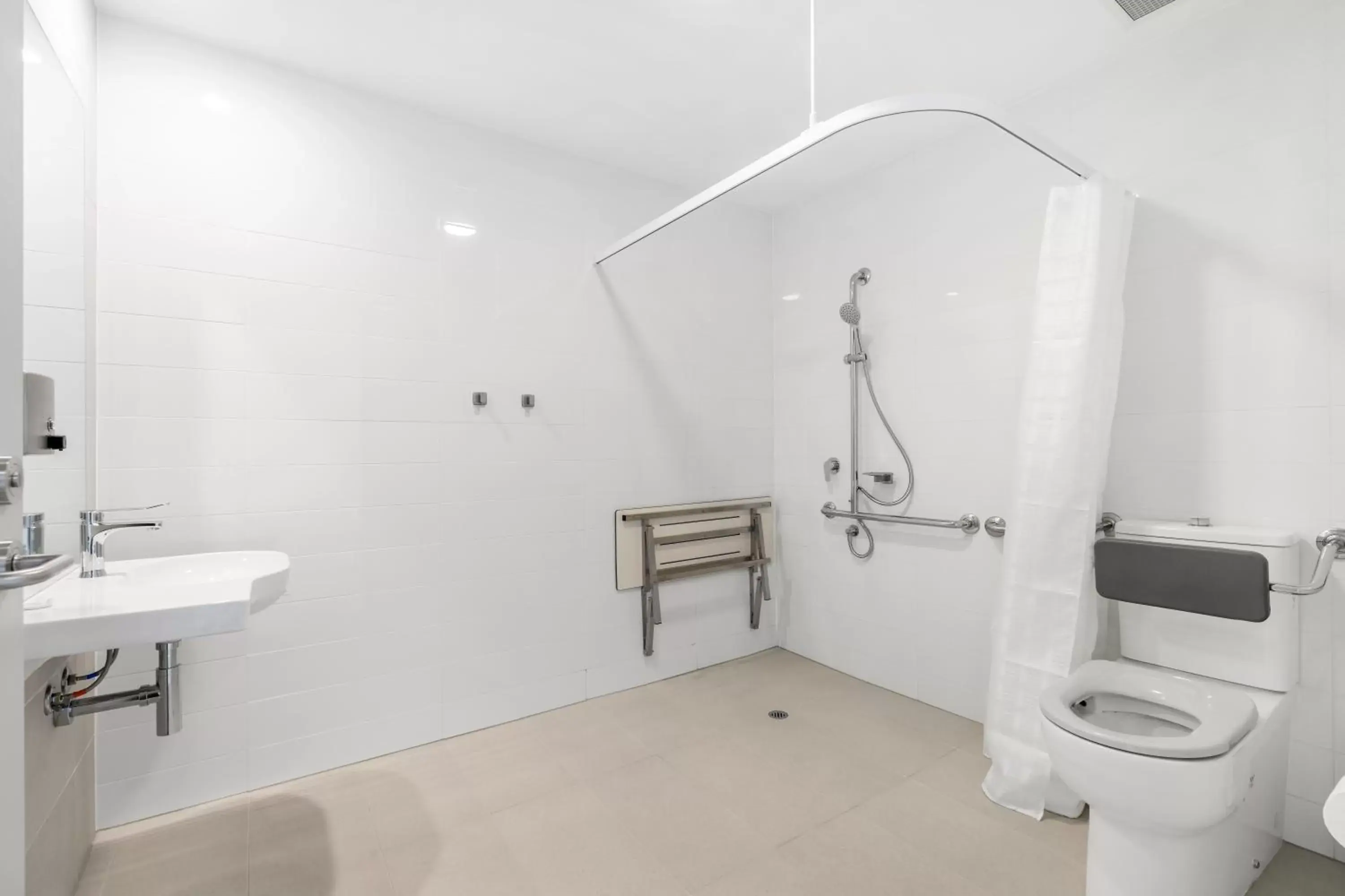 Shower, Bathroom in Essence Suites Taringa