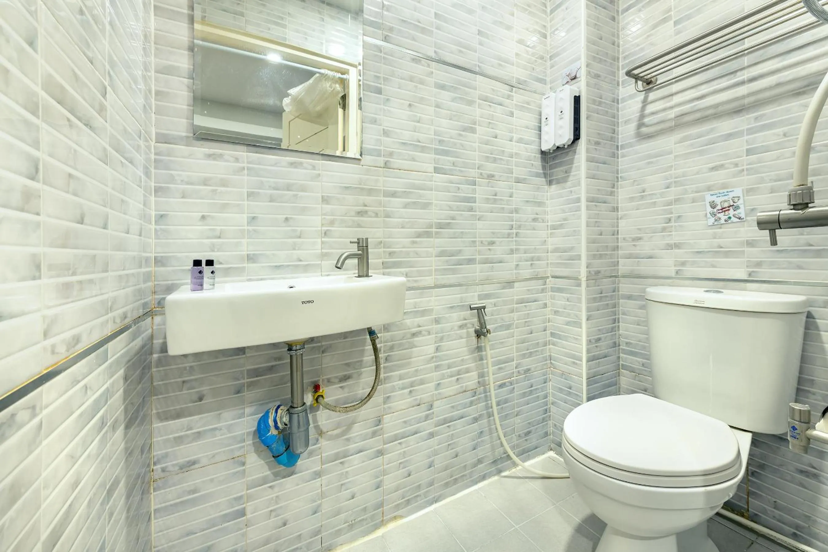 Bathroom in De Lavender Bangkok Hotel