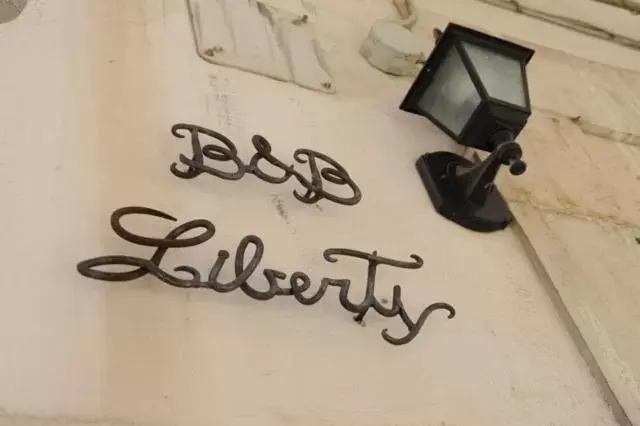 Property logo or sign in B&B Liberty