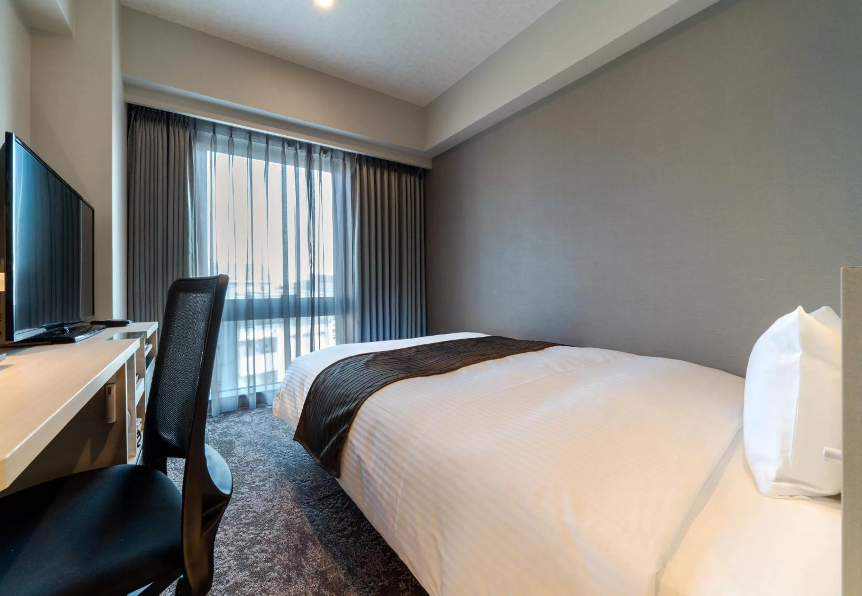Photo of the whole room, Bed in DEL style Fukuoka Nishinakasu by Daiwa Roynet Hotel