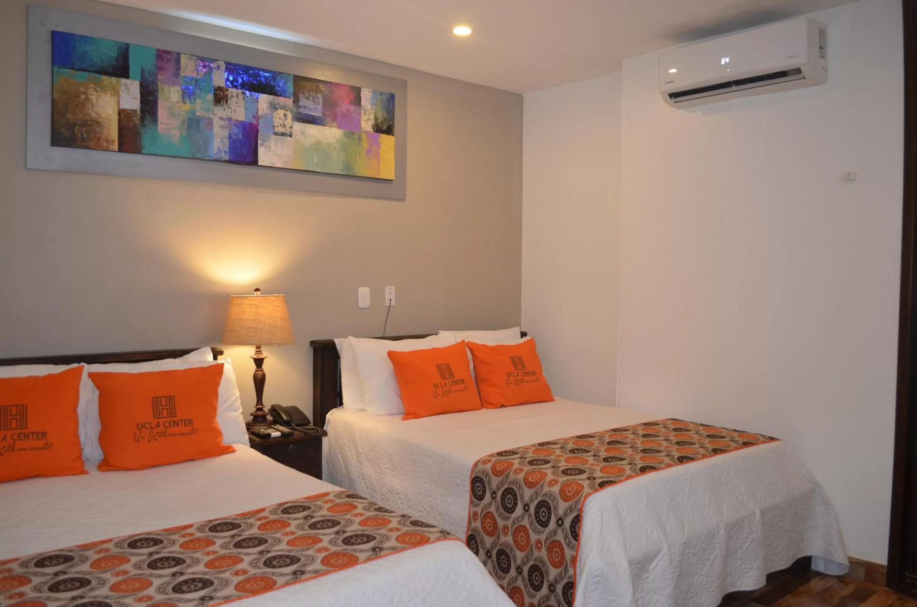 Photo of the whole room, Bed in Hotel Ucla Center