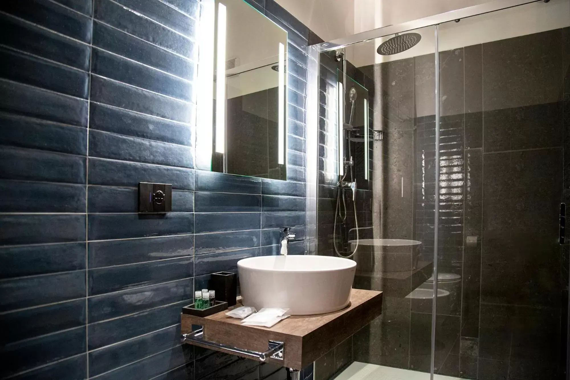 Bathroom in MANTRA Suite&Rooms
