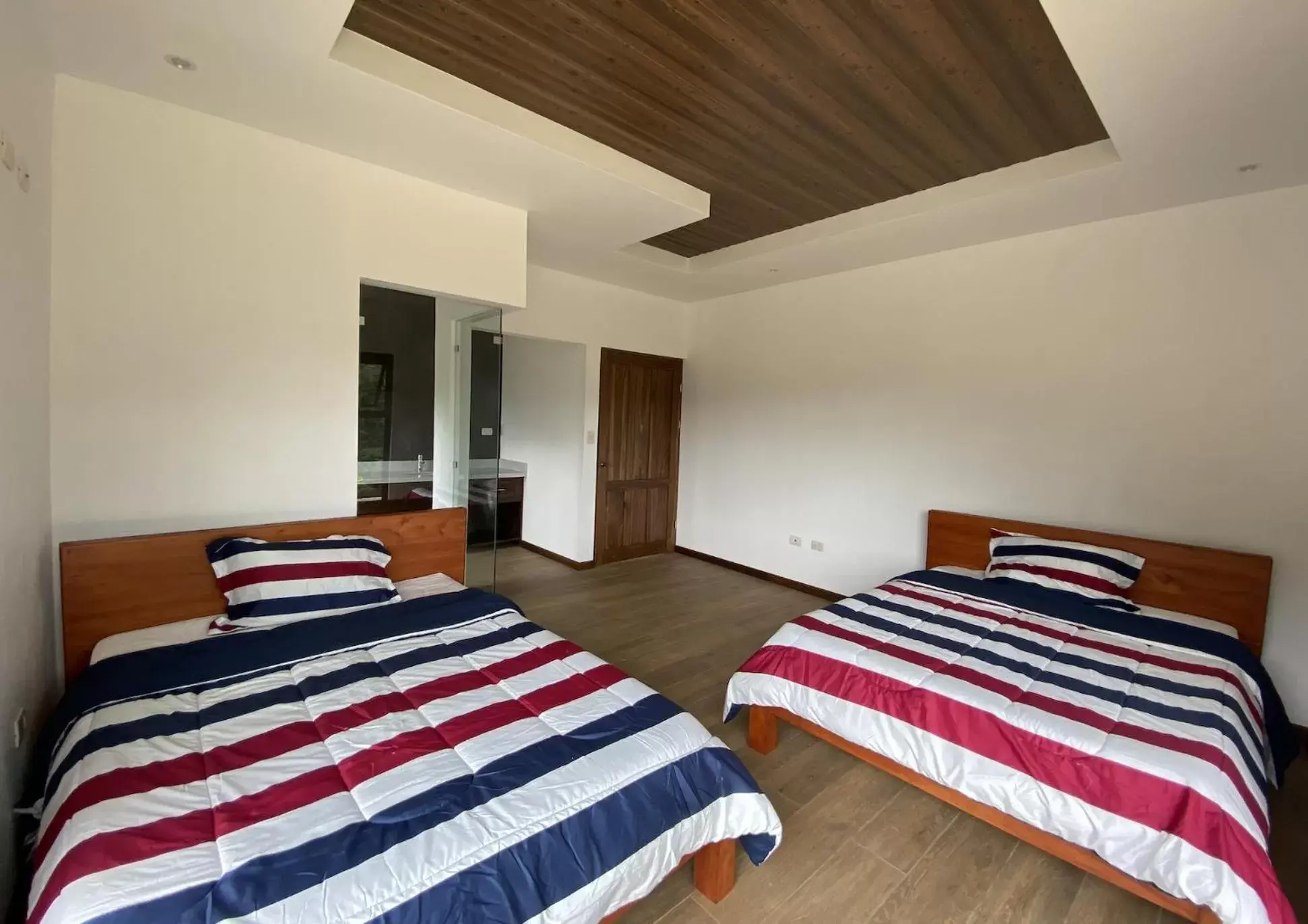 Bed in Arte de Plumas birding lodge