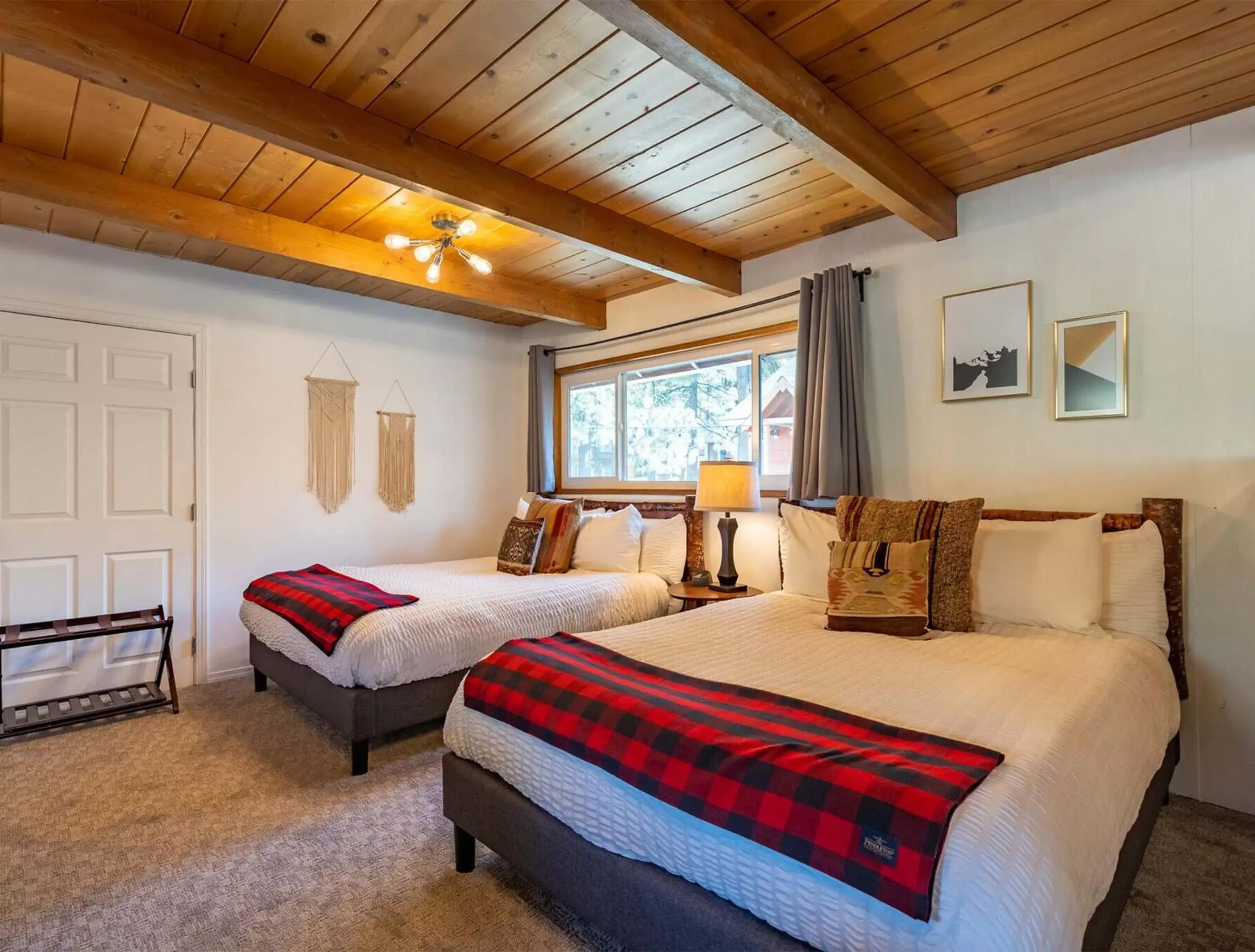 Bed in Grand Pine Cabins