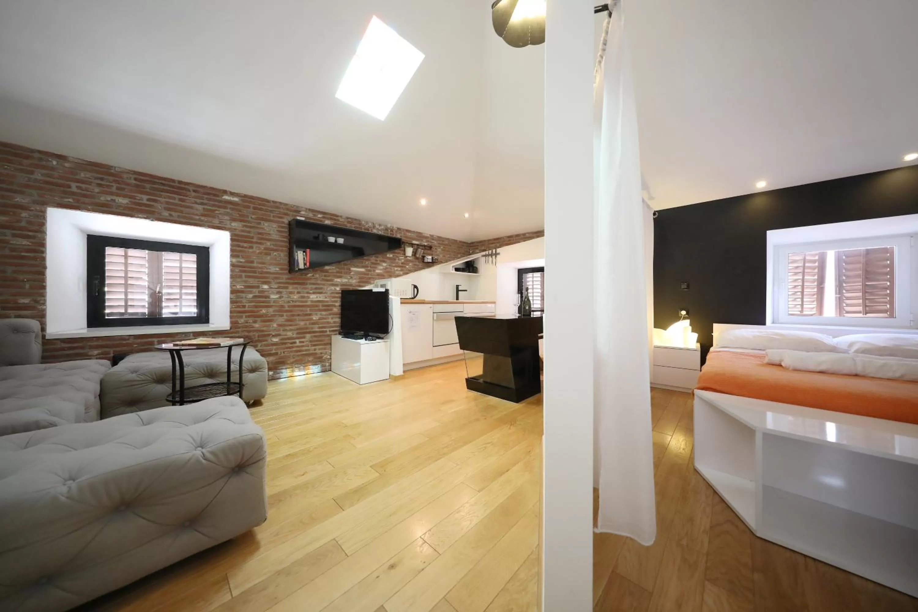 Living room, Bed in Central Apartments Integrated Hotel