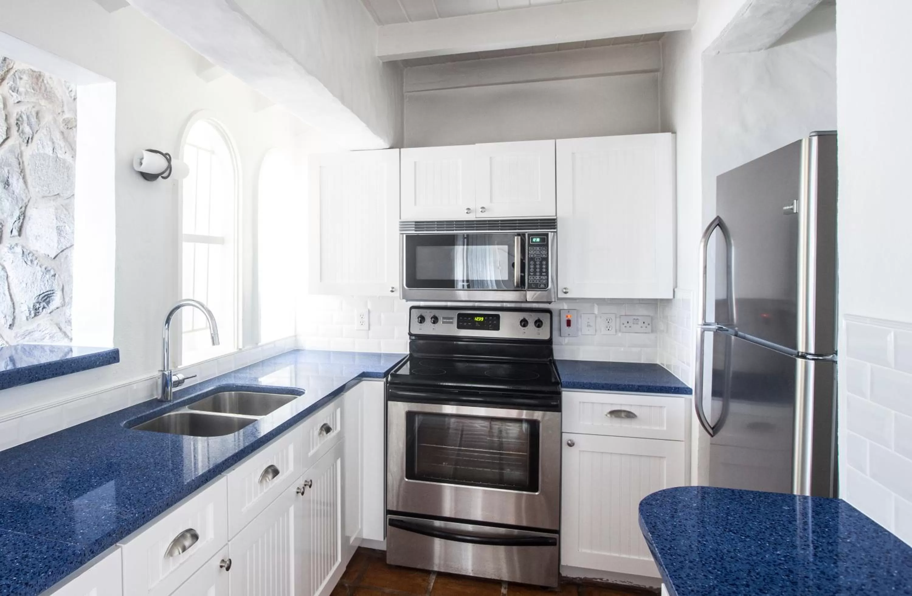Kitchen or kitchenette in Windjammer Landing Resort and Residences
