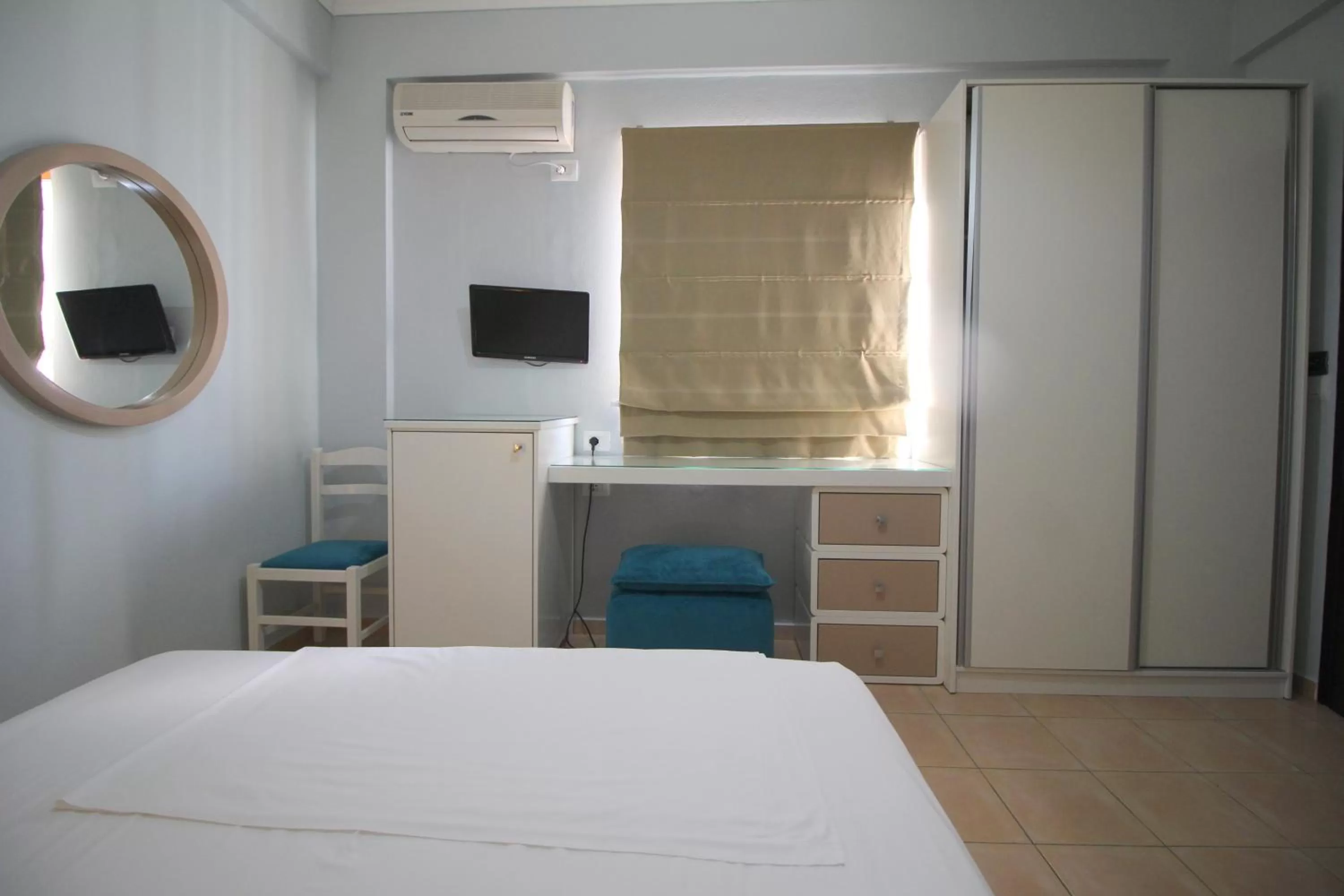 Bed in Murati Suites Sarandë