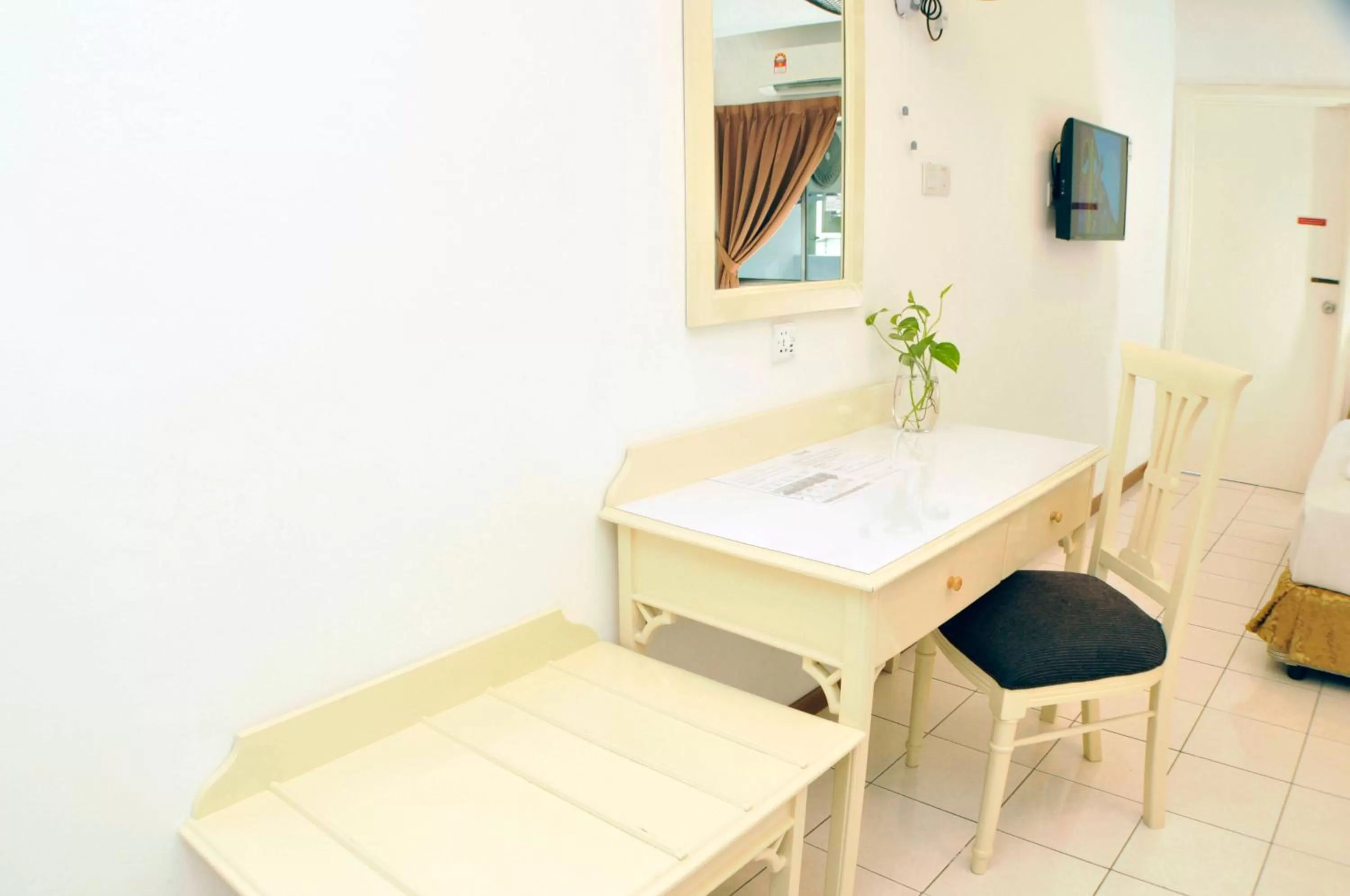 Bedroom in Promenade Service Apartment