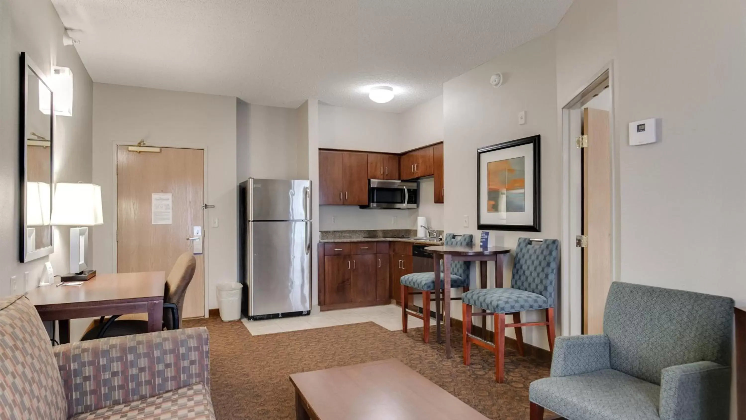 Photo of the whole room, Kitchen/Kitchenette in Holiday Inn Express and Suites St. Cloud, an IHG Hotel