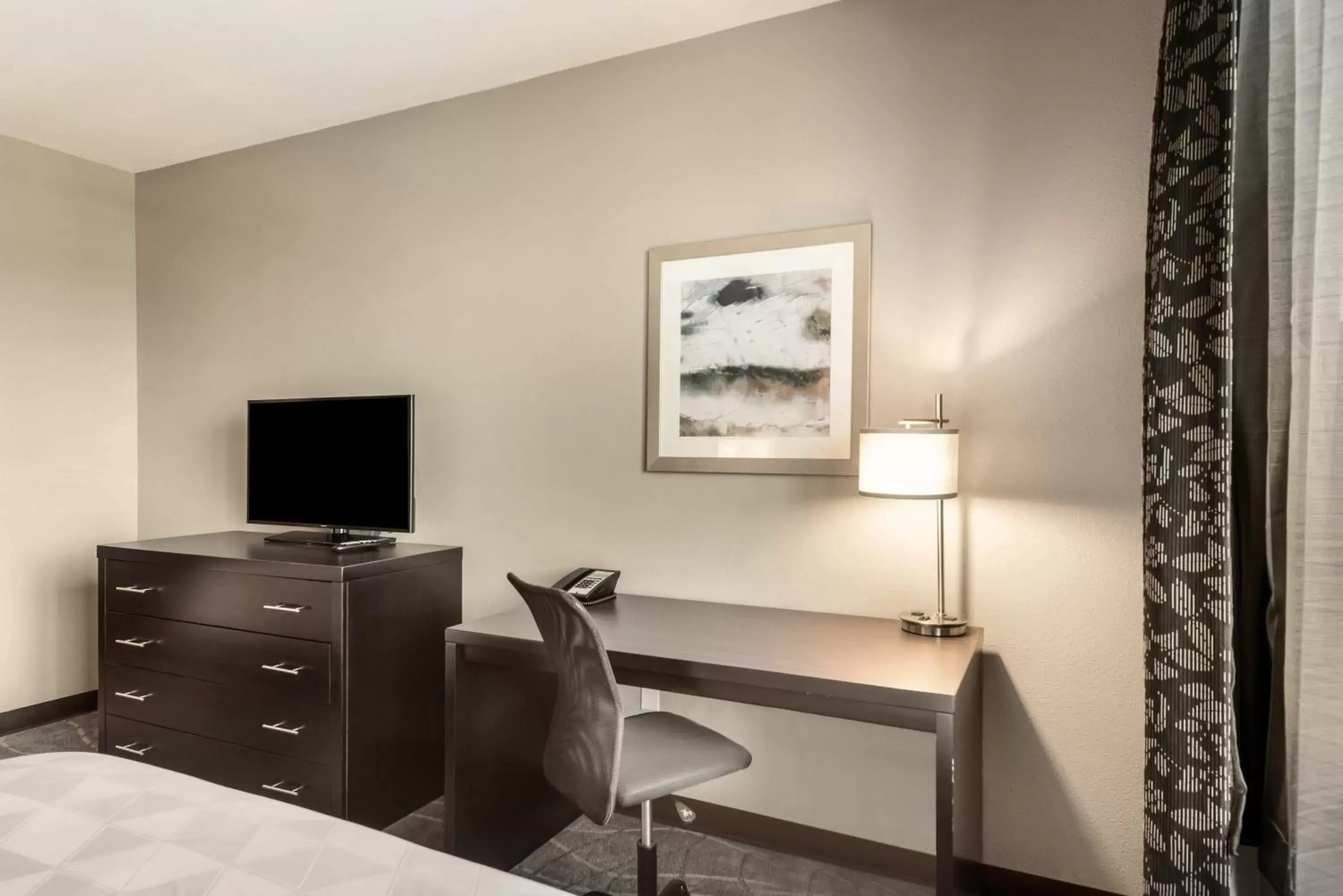 Photo of the whole room, TV/Entertainment Center in Holiday Inn Hotel & Suites Silicon Valley – Milpitas, an IHG Hotel