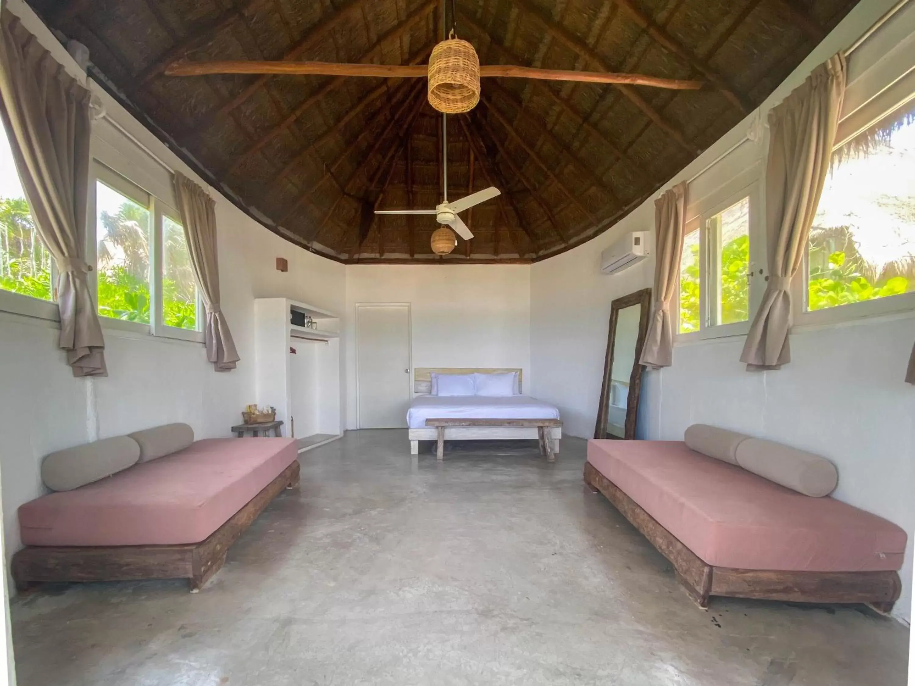 Photo of the whole room, Seating Area in Tuup Tulum Oceanfront or road side rooms