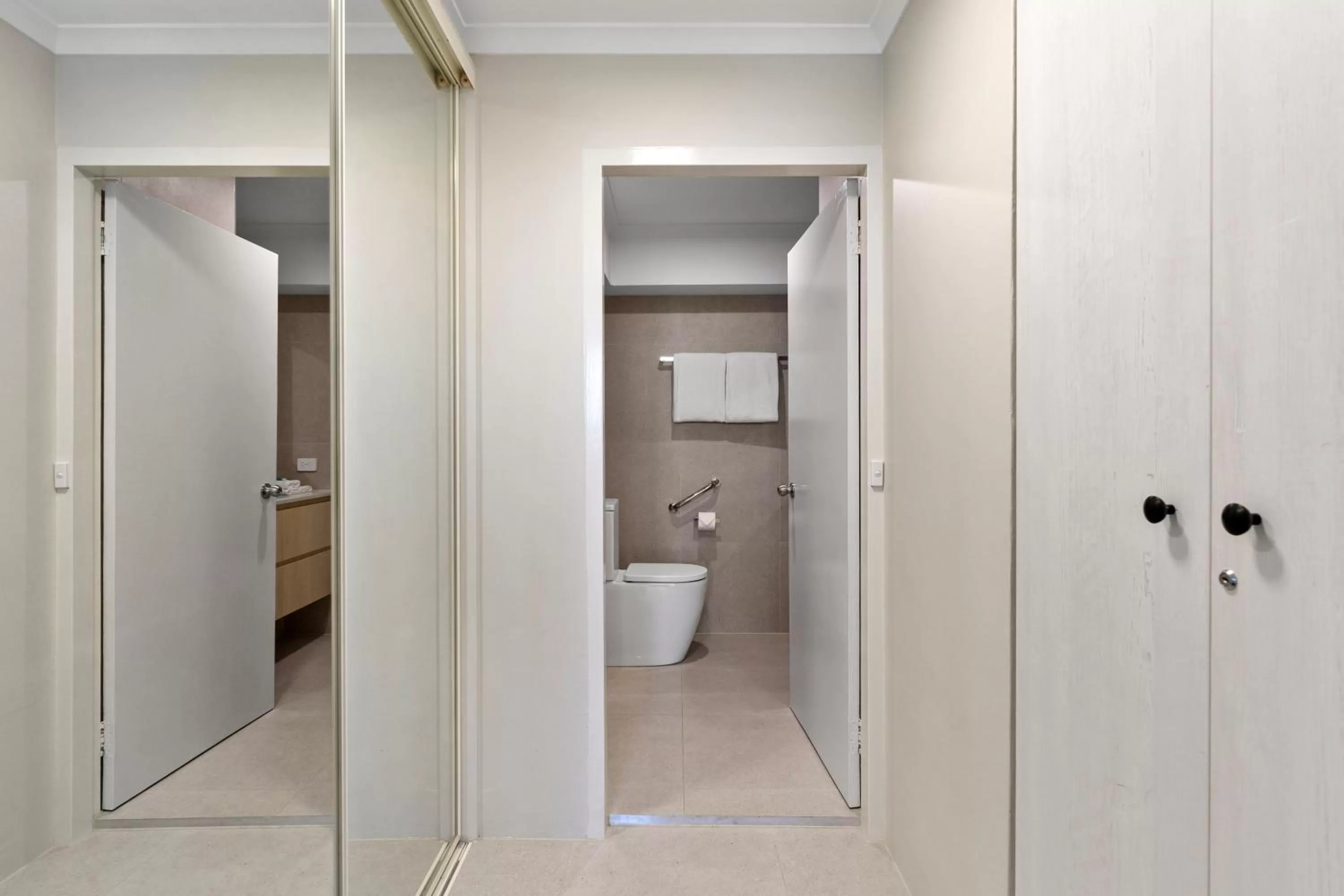 Bathroom in 84 The Spit Holiday Apartments