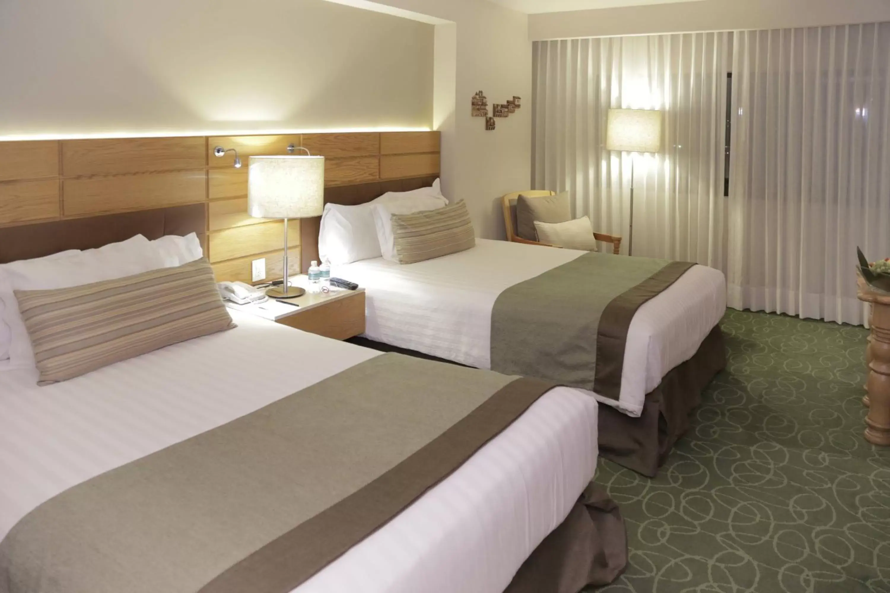 Photo of the whole room, Bed in Marriott Tuxtla Gutierrez Hotel