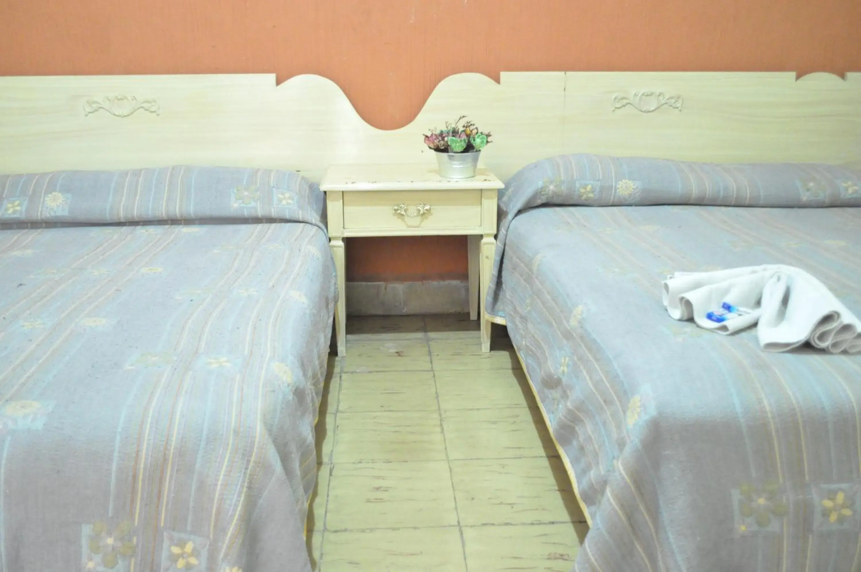 Bed in Hotel Metropolitan I