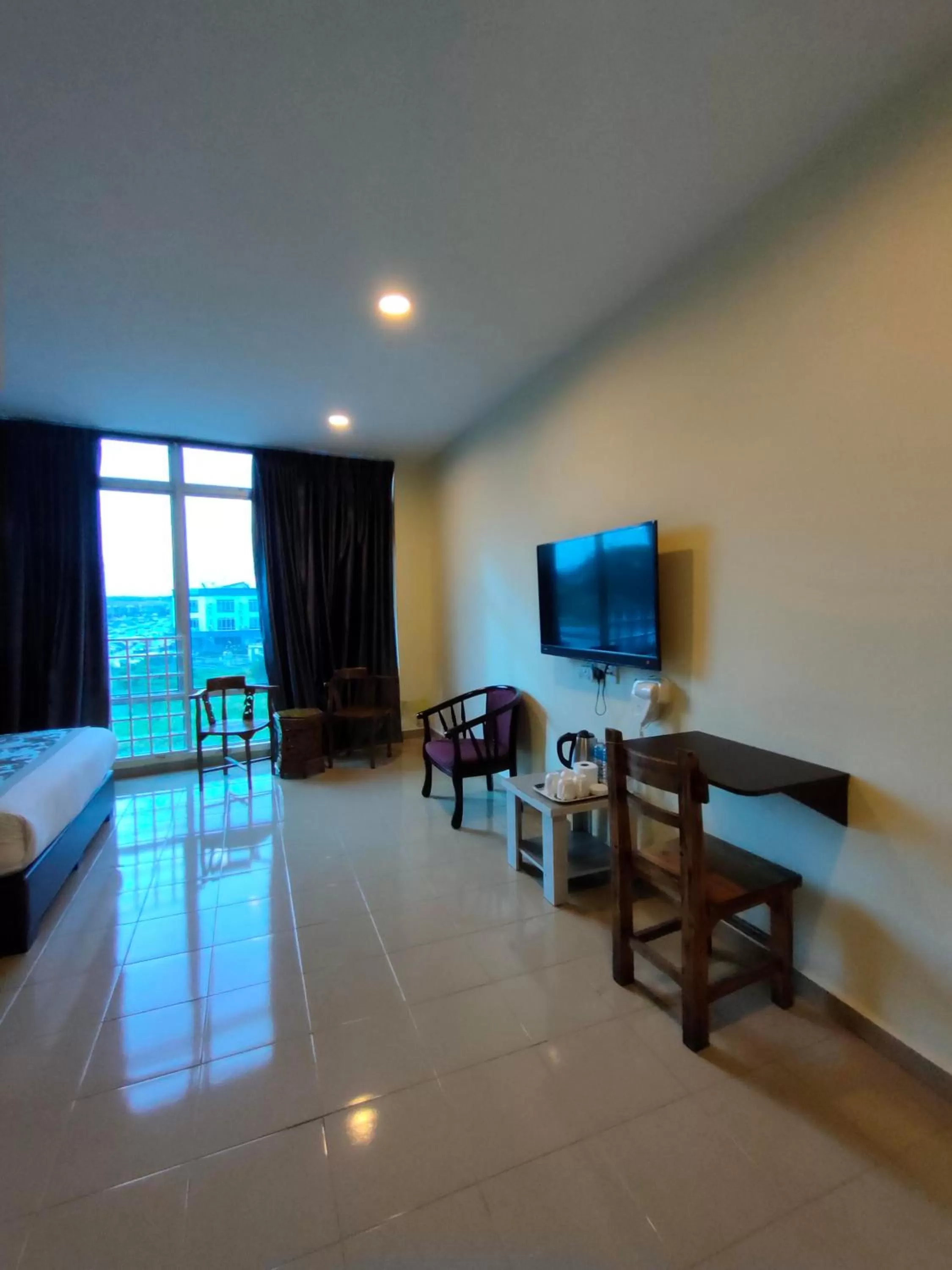 Communal lounge/ TV room in TIONG HUA HOTEL