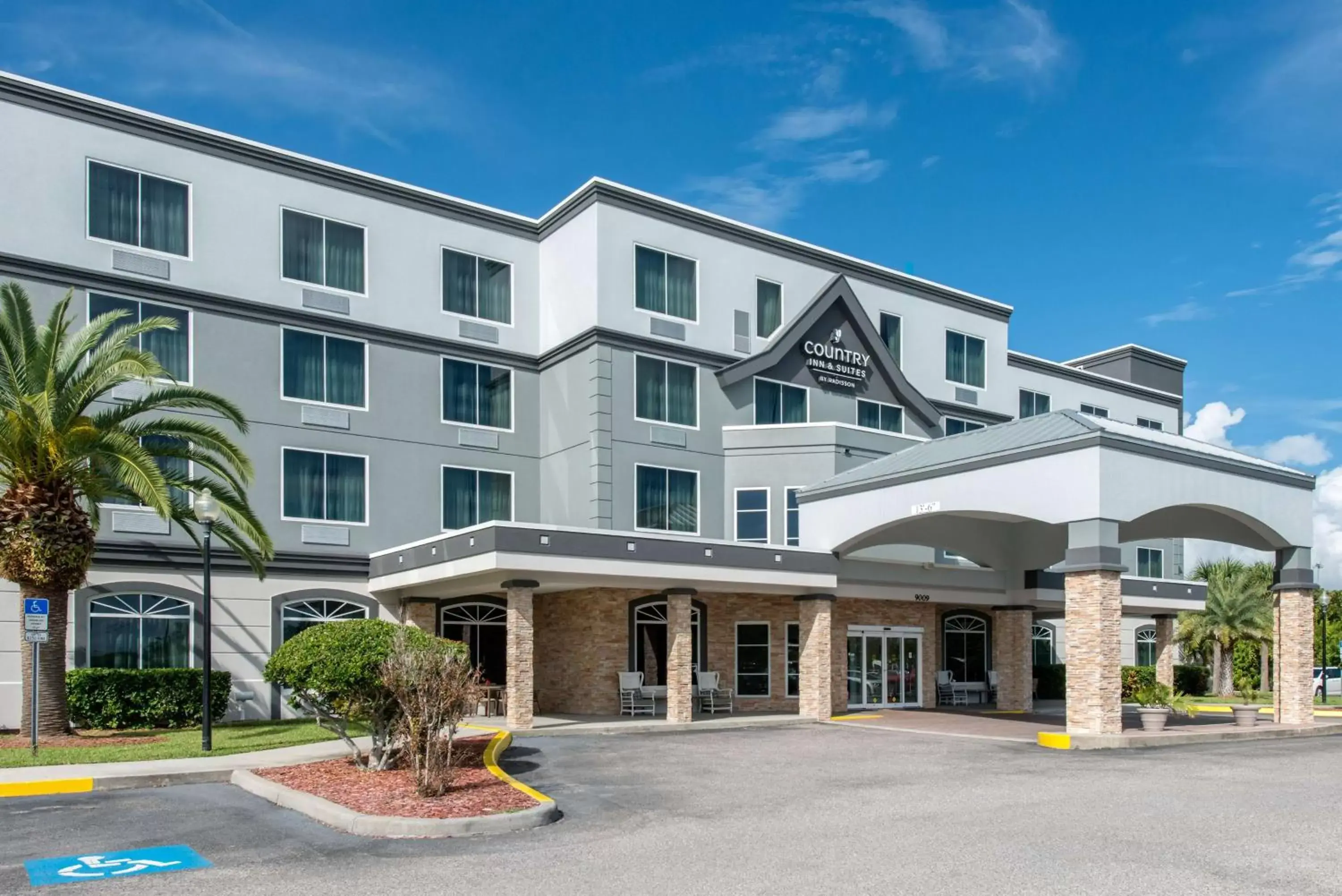 Property Building in Country Inn & Suites by Radisson, Port Canaveral, FL