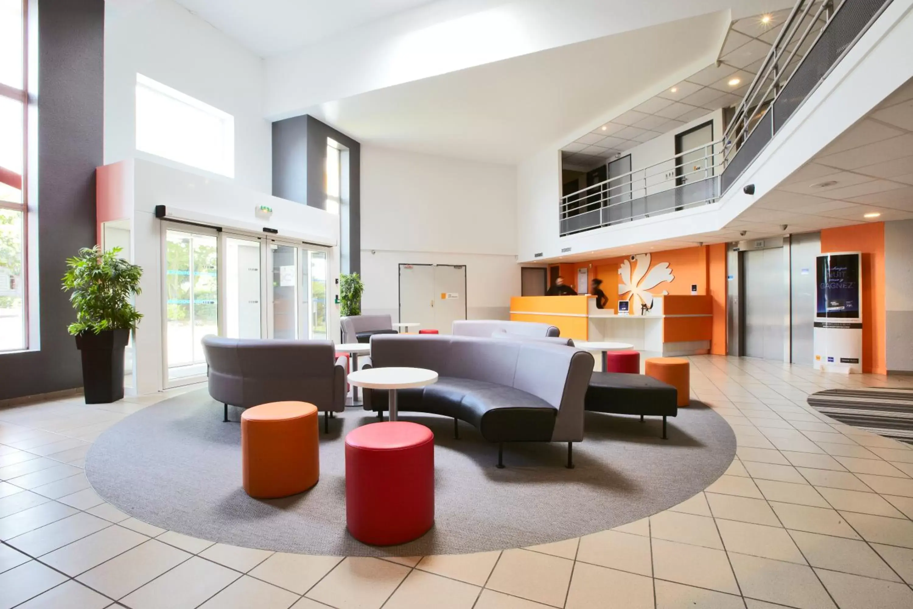 Lobby or reception in Premiere Classe Roissy CDG - Paris Nord 2 - Parc des Expositions Lobby or reception in Premiere Classe Roissy CDG - Paris Nord 2 - Parc des Expositions