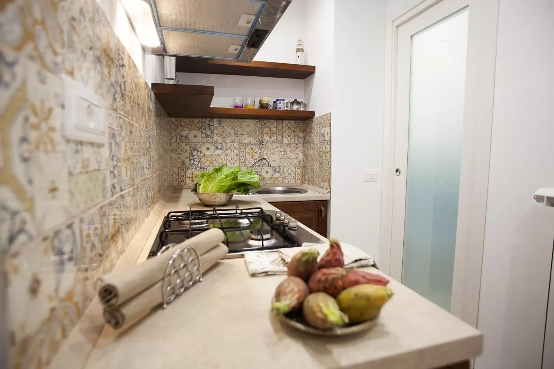Kitchen or kitchenette in Le Tolde del Corallone
