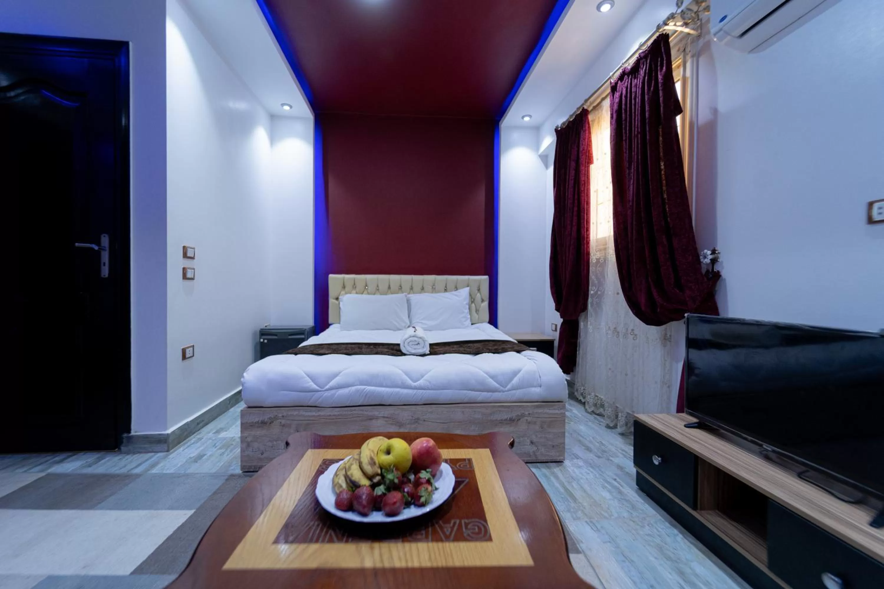 Bed in Gardenia Inn Hotel