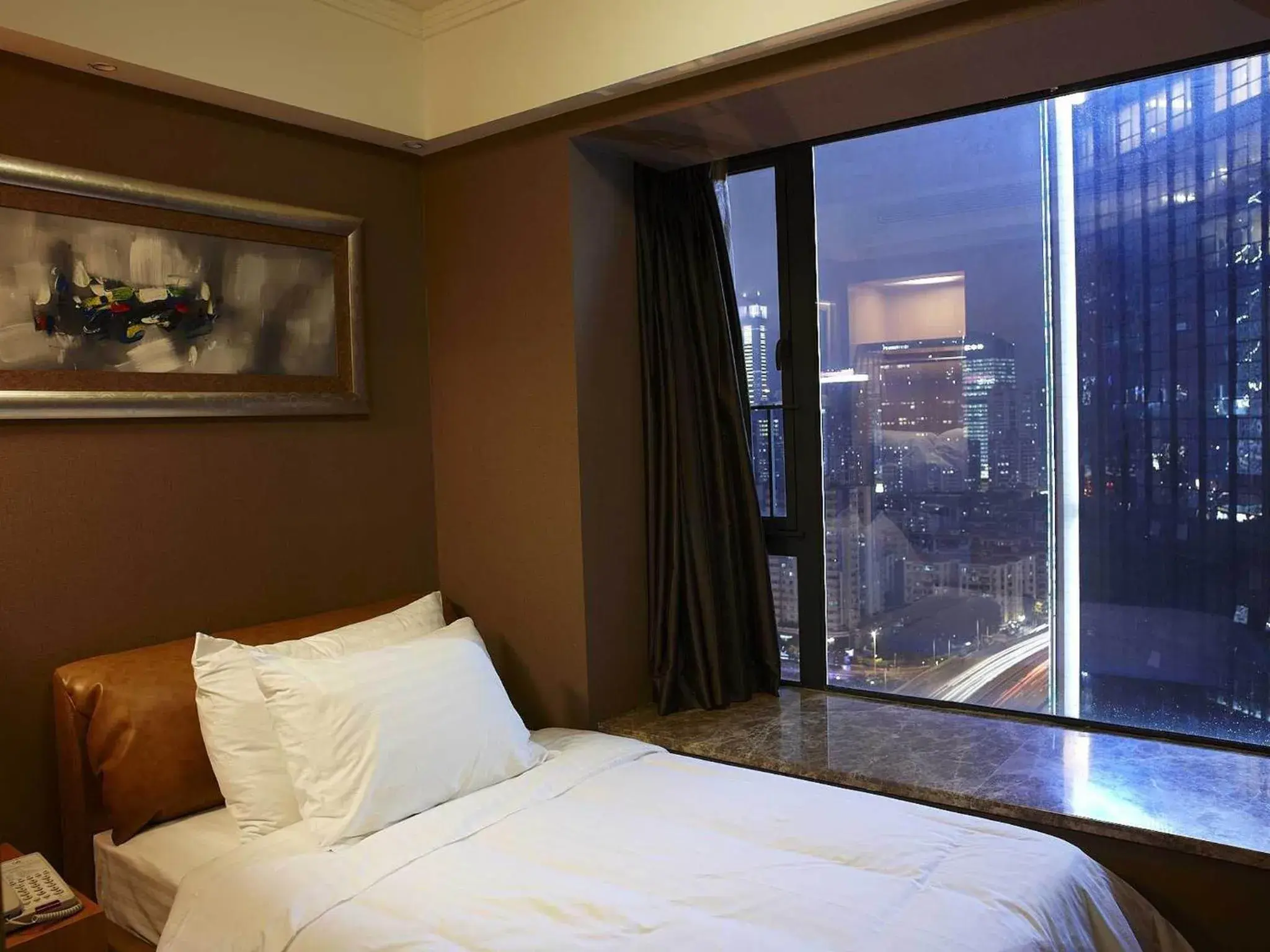 Bed in Dan Executive Hotel Apartment Zhujiang New Town