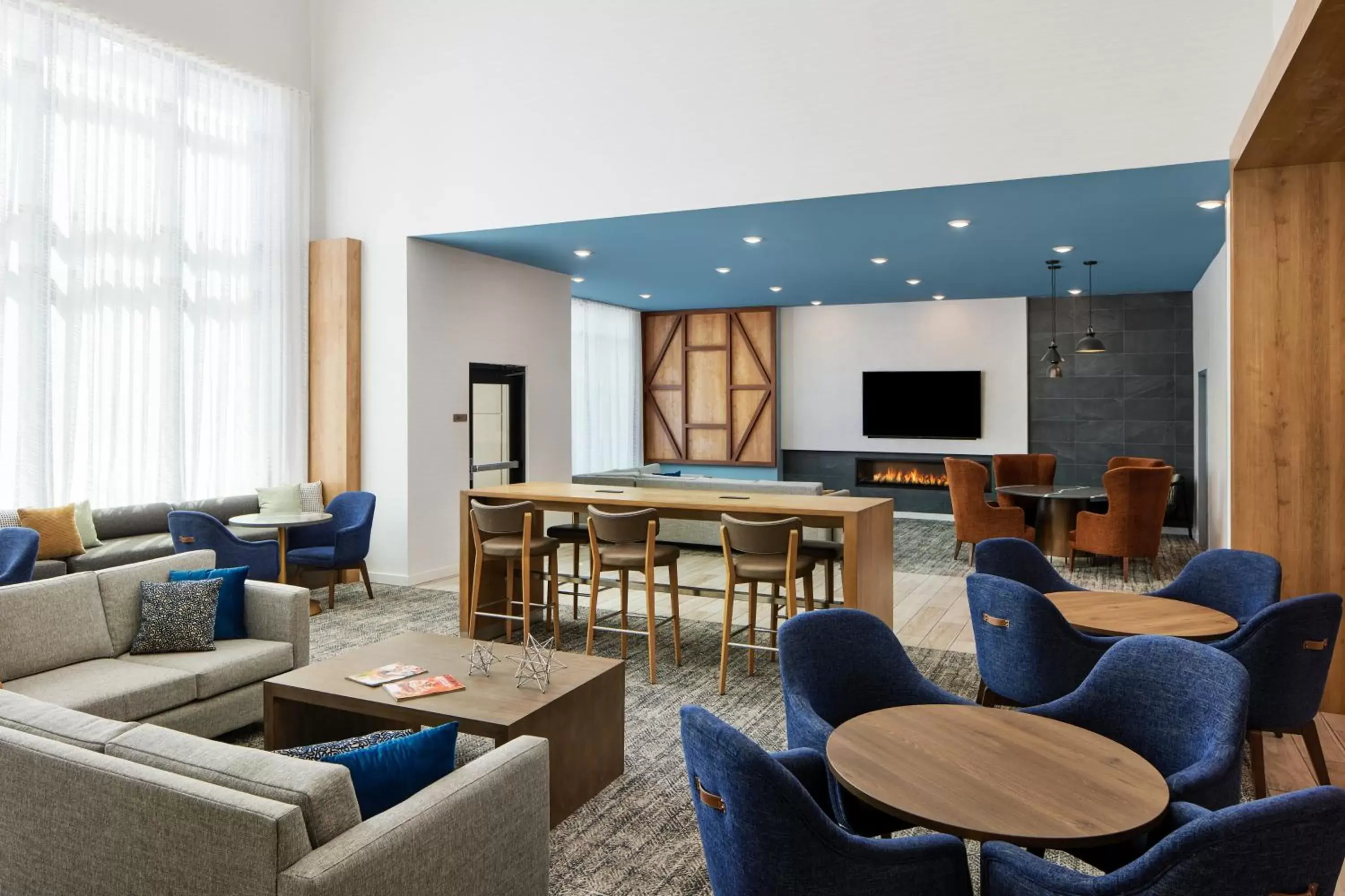 Lobby or reception in Staybridge Suites - Auburn - University Area, an IHG Hotel Lobby or reception in Staybridge Suites - Auburn - University Area, an IHG Hotel