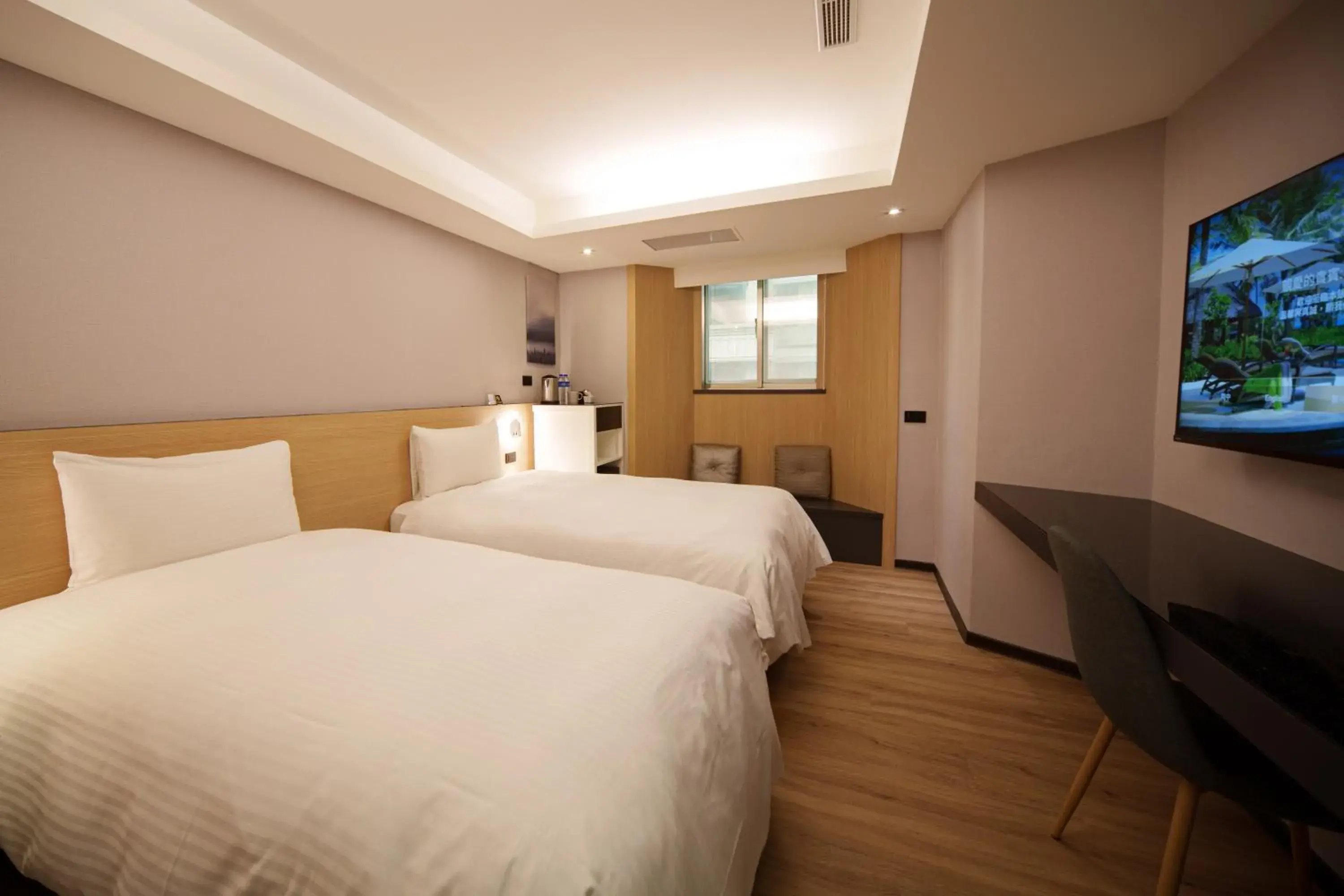 Bed in Hub Hotel Tucheng