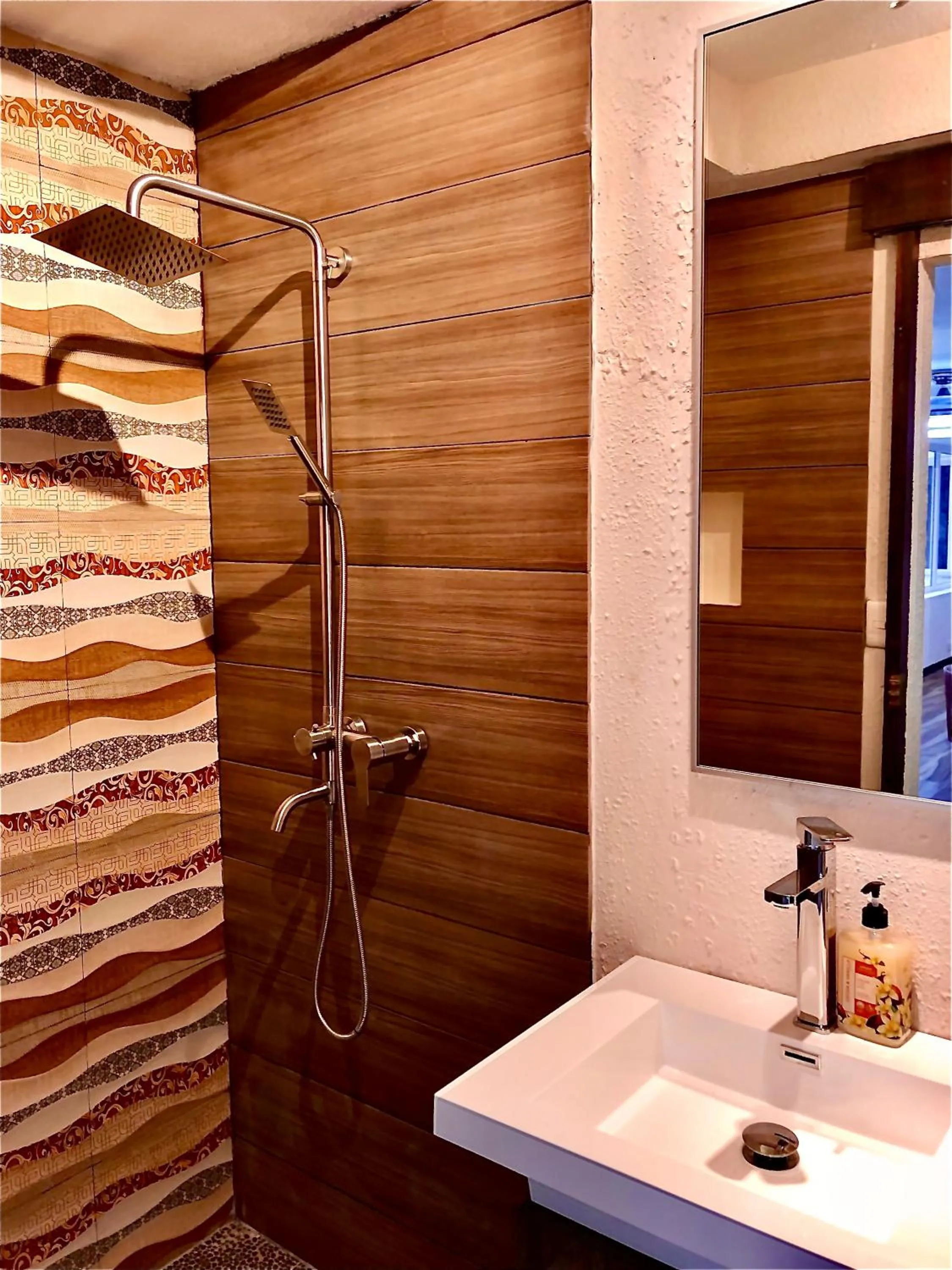 Bathroom in Sunset At Aninuan Beach Resort