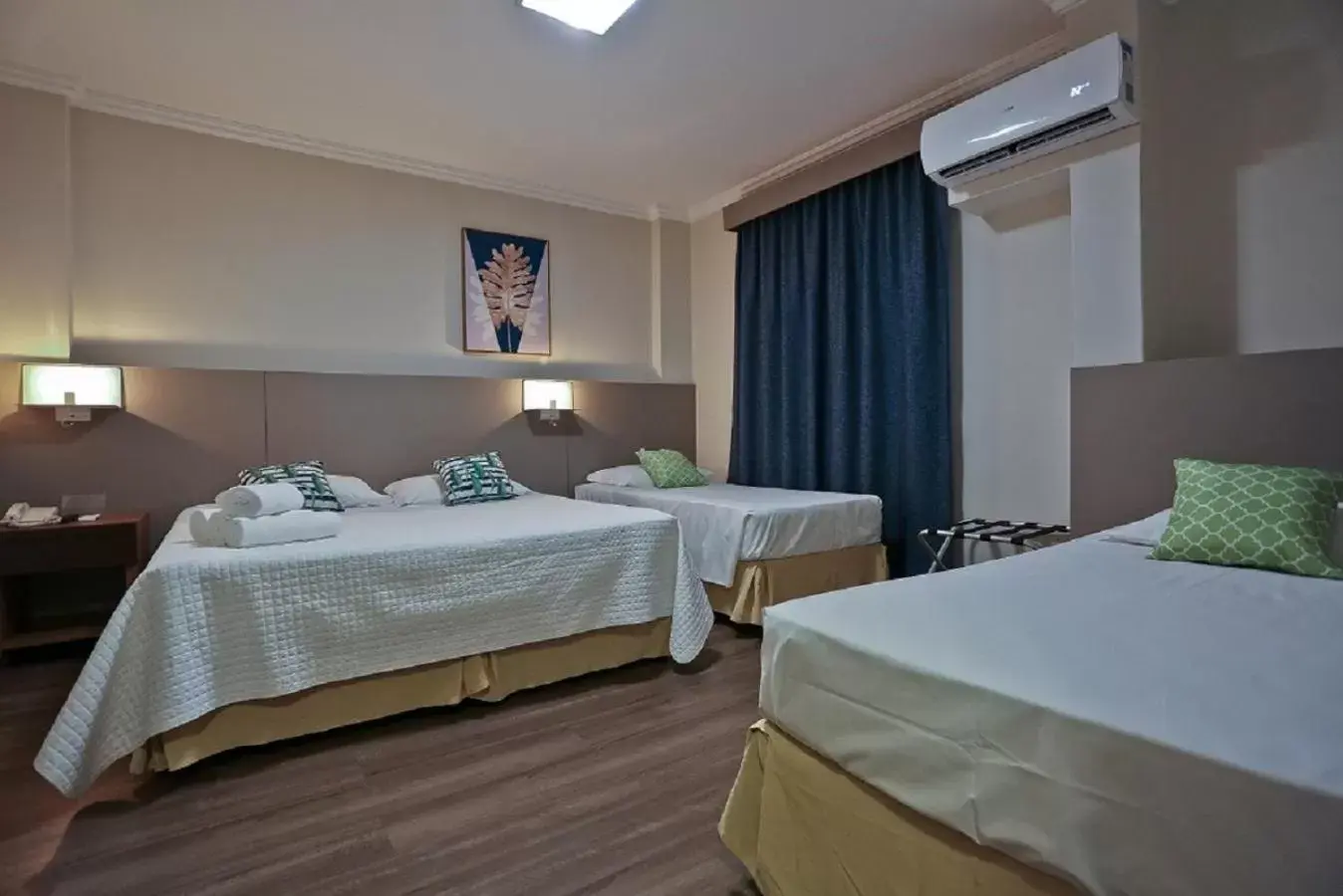 Bed in Sandri City Hotel