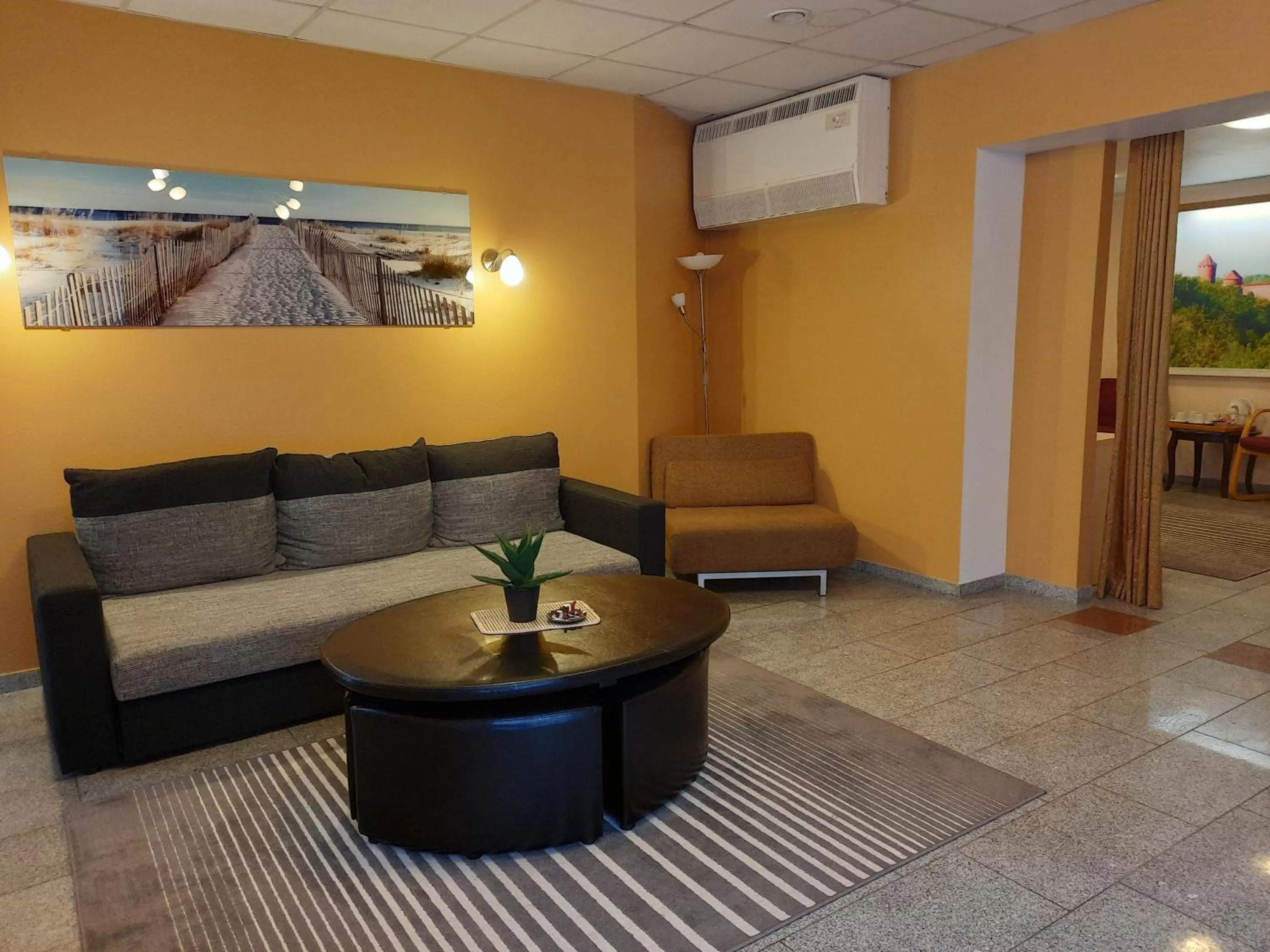 Living room in Hotel Pils with Self-Check in