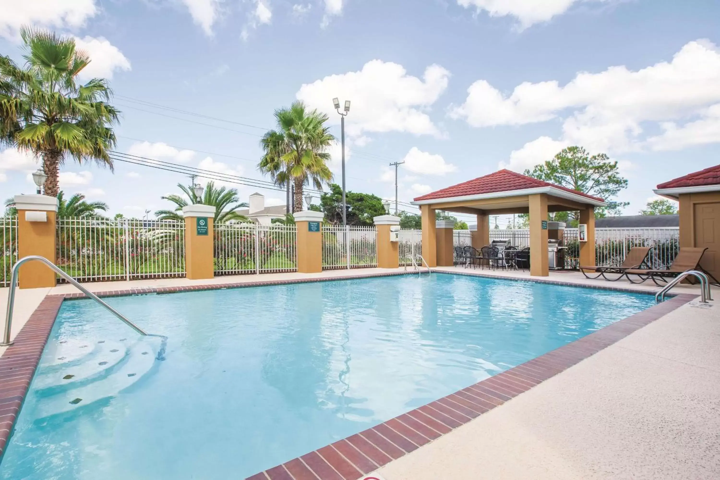 On site, Swimming Pool in La Quinta by Wyndham Bay City