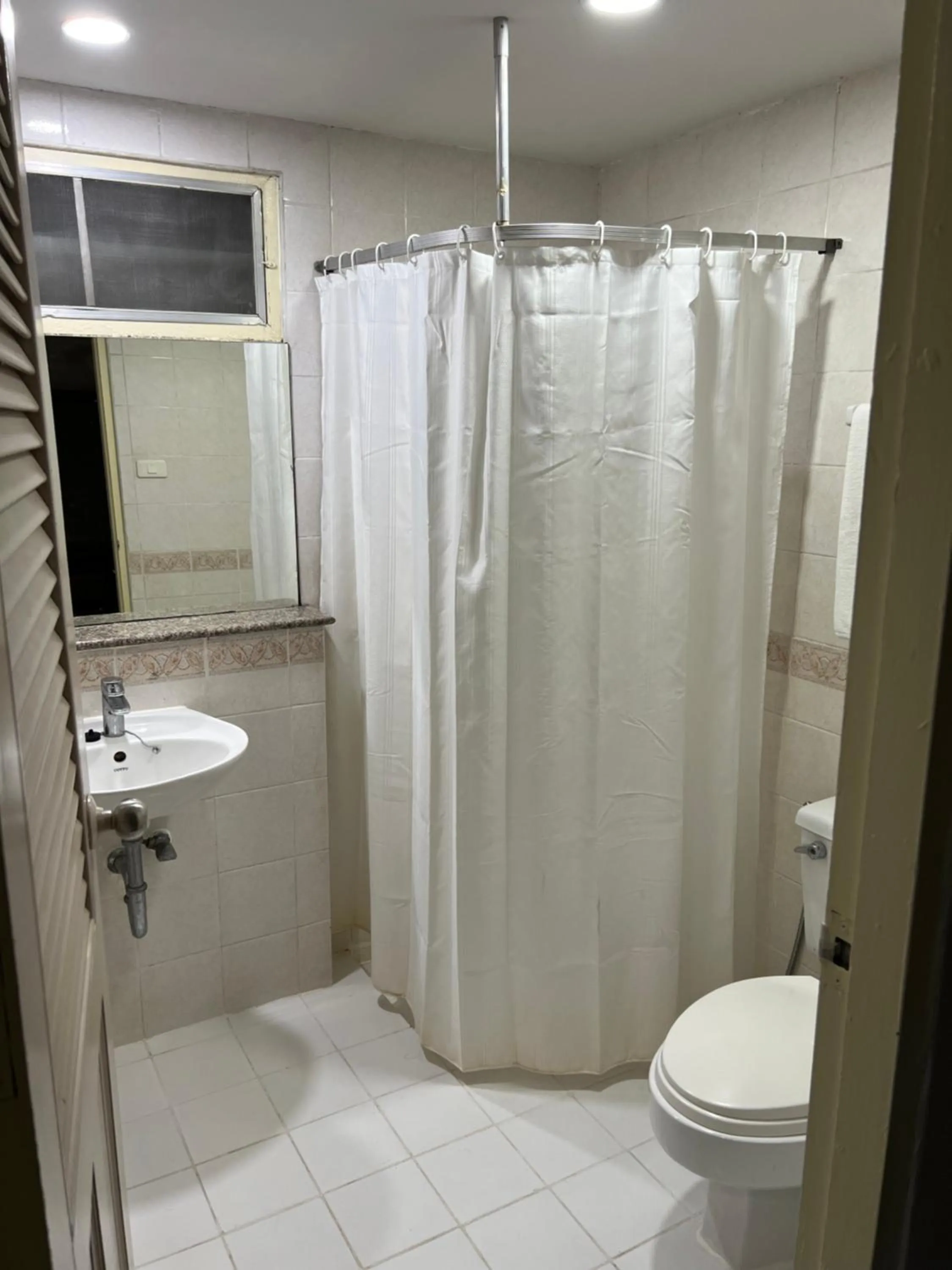 Bathroom in Mall Suites Hotel