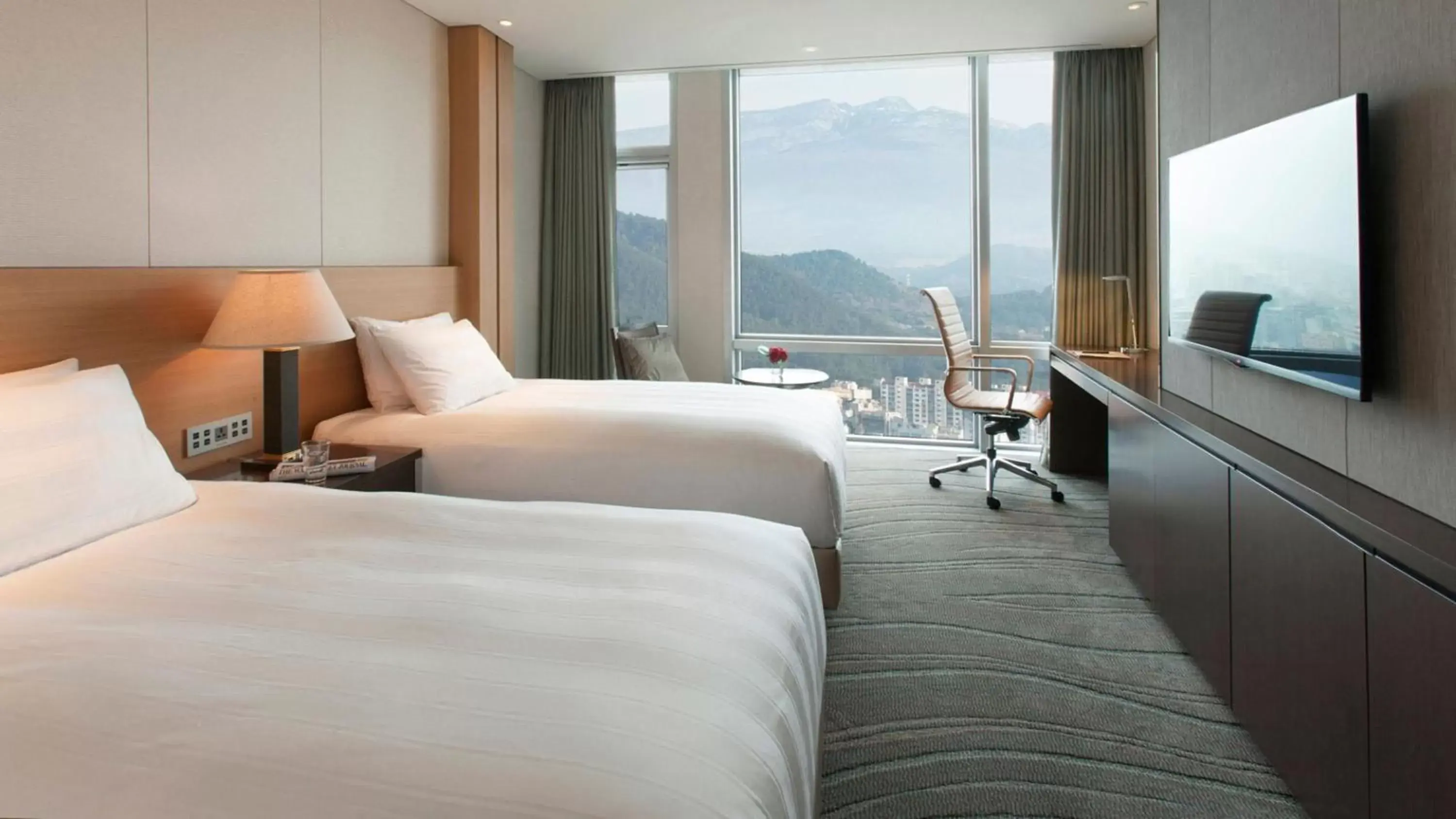 Bed, Mountain View in Lotte City Hotel Jeju