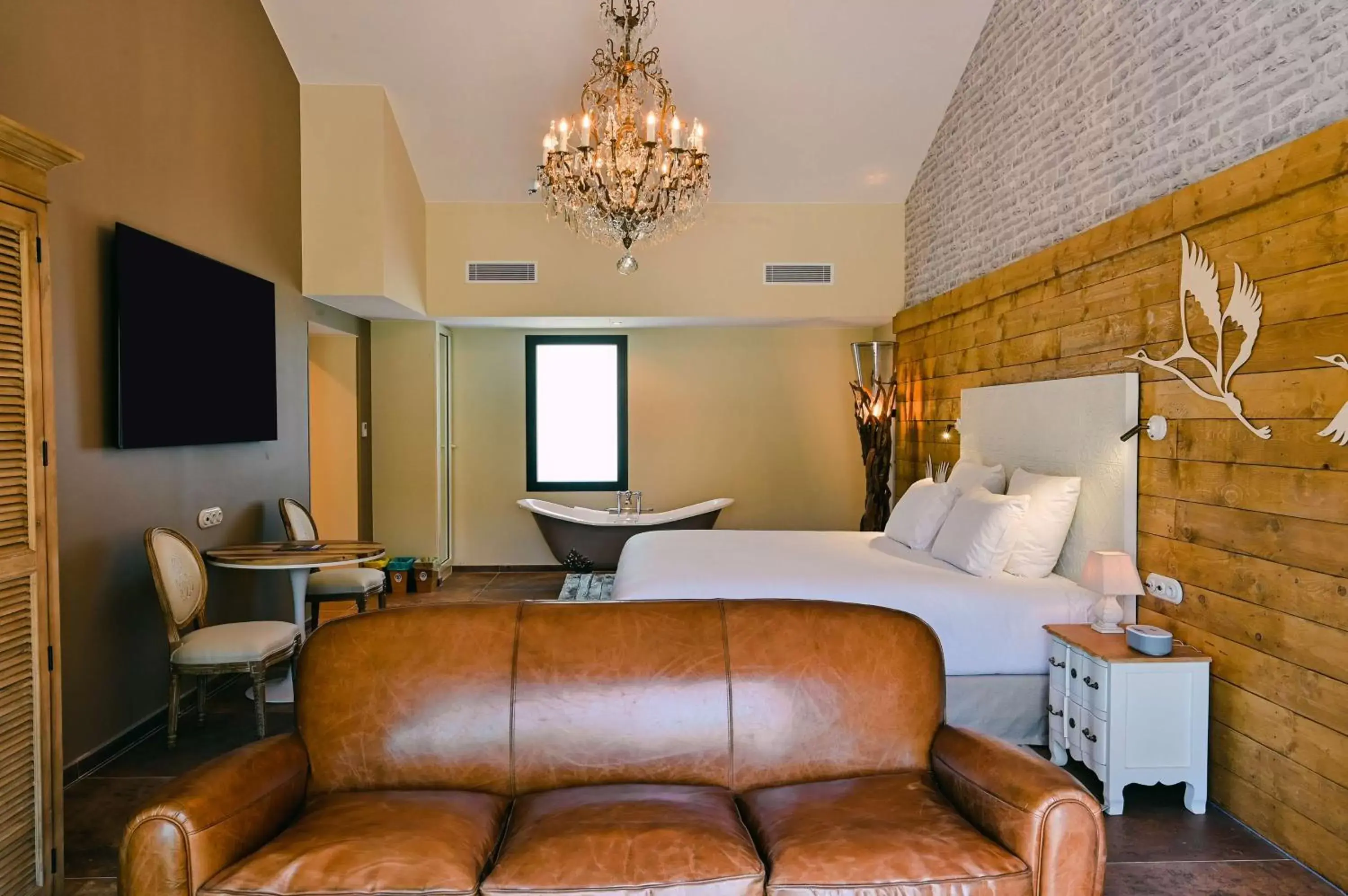 Living room, Bed in Le Hameau Des Pesquiers Ecolodge & Spa, Curio Collection By Hilton