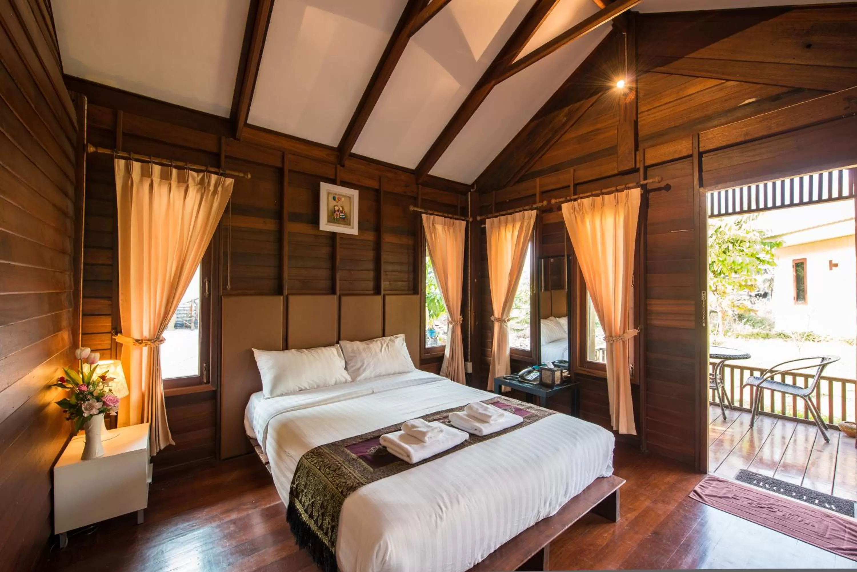 Bed in Panlaan Boutique Resort