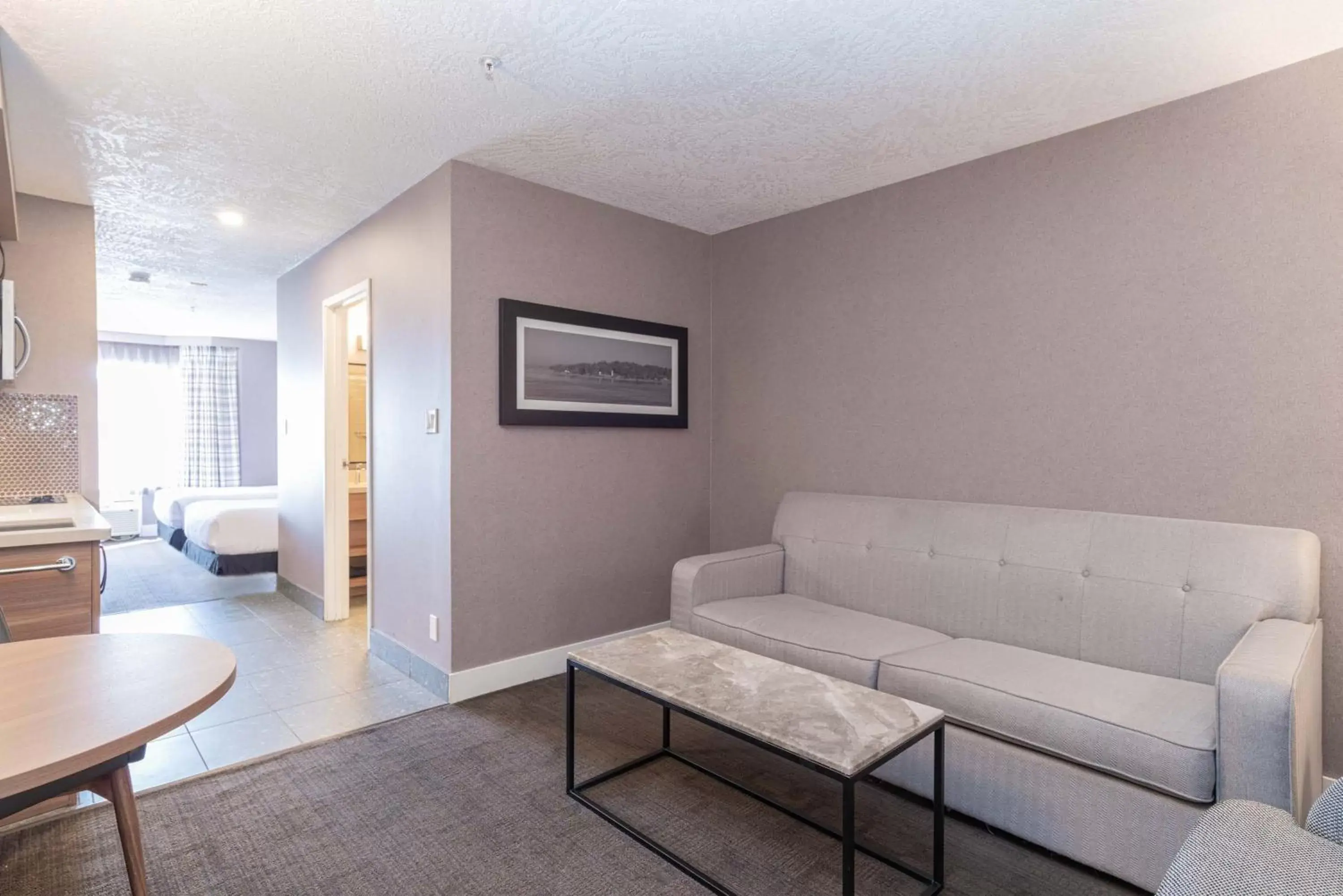 Living room, Bed in Sandman Hotel Victoria Living room, Bed in Sandman Hotel Victoria