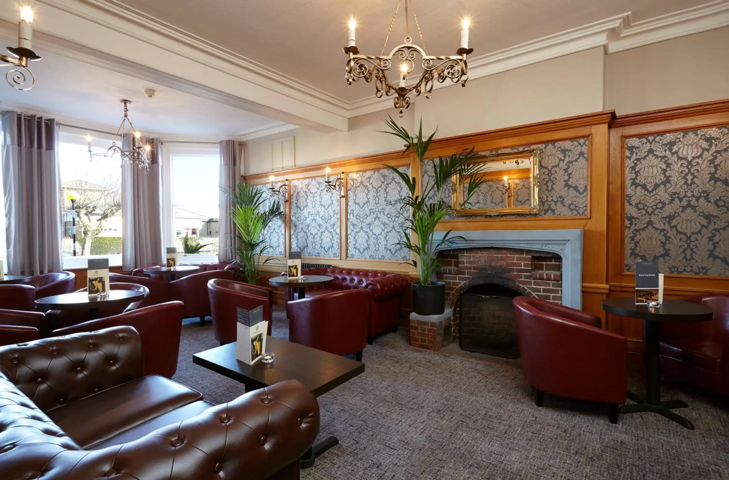 Communal lounge/ TV room in Royal Esplanade Hotel