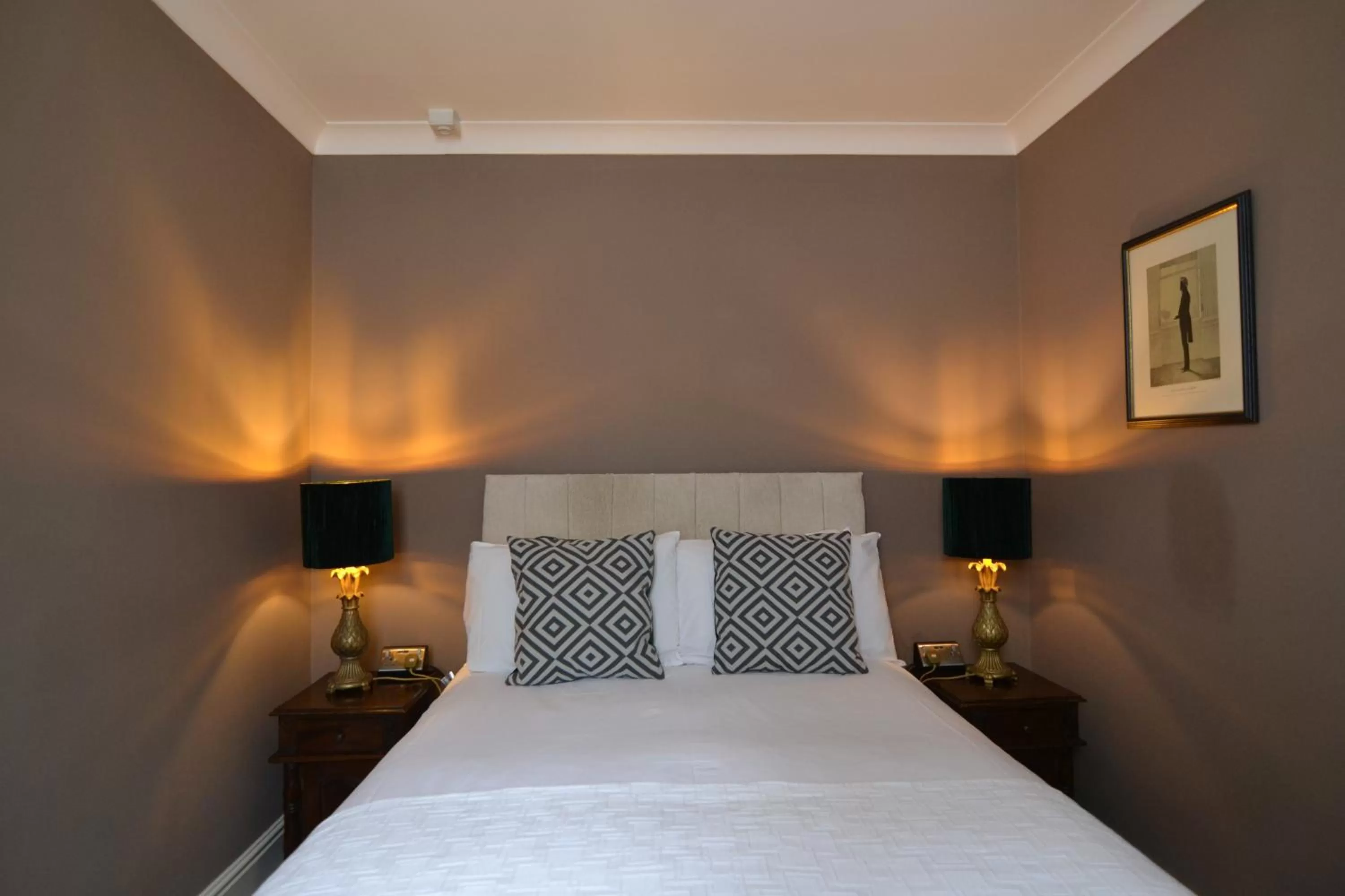 Bed in Angel and Royal Hotel