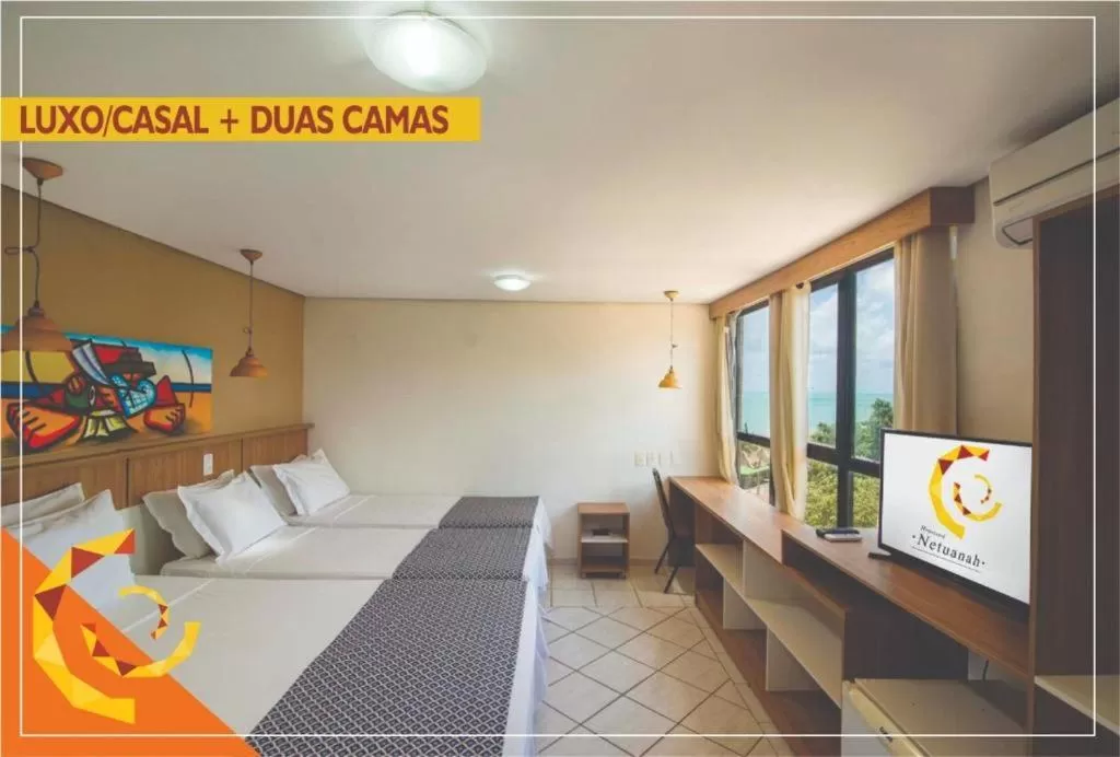 Bed in Netuanah Praia Hotel