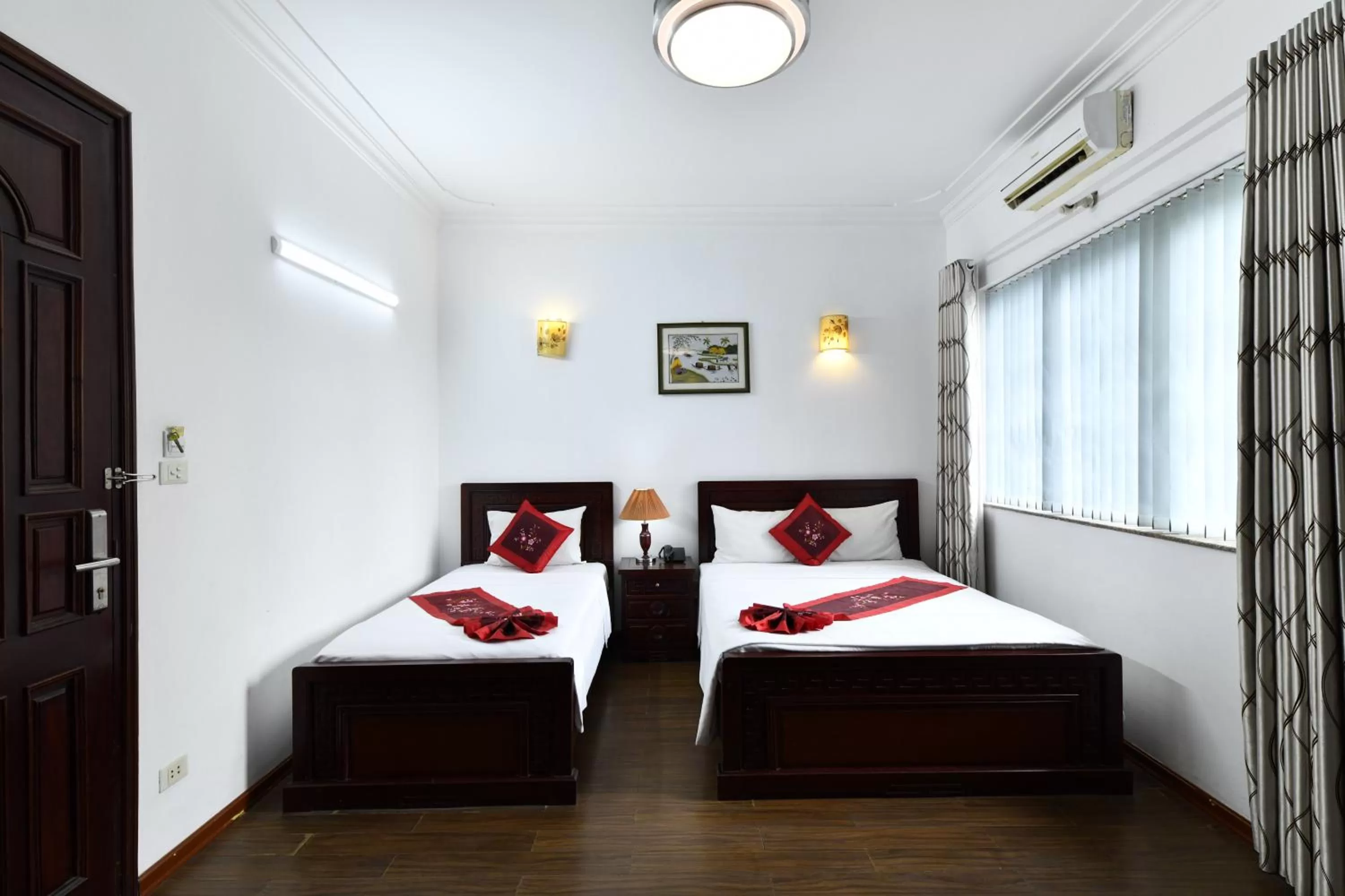 Bed in Phoenix Legend Hotel Hanoi