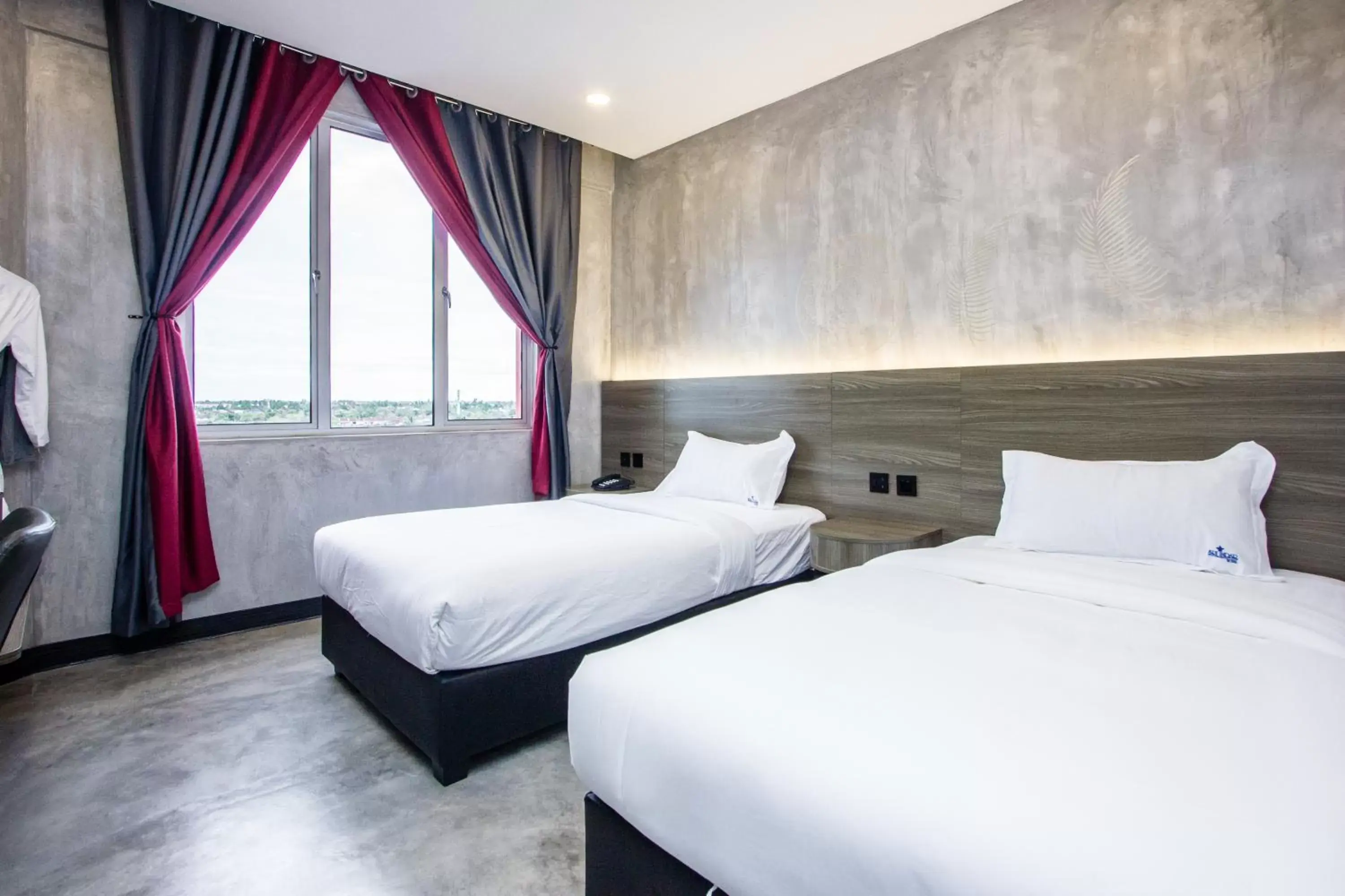 Bed in Sri Indar Hotel & Suites