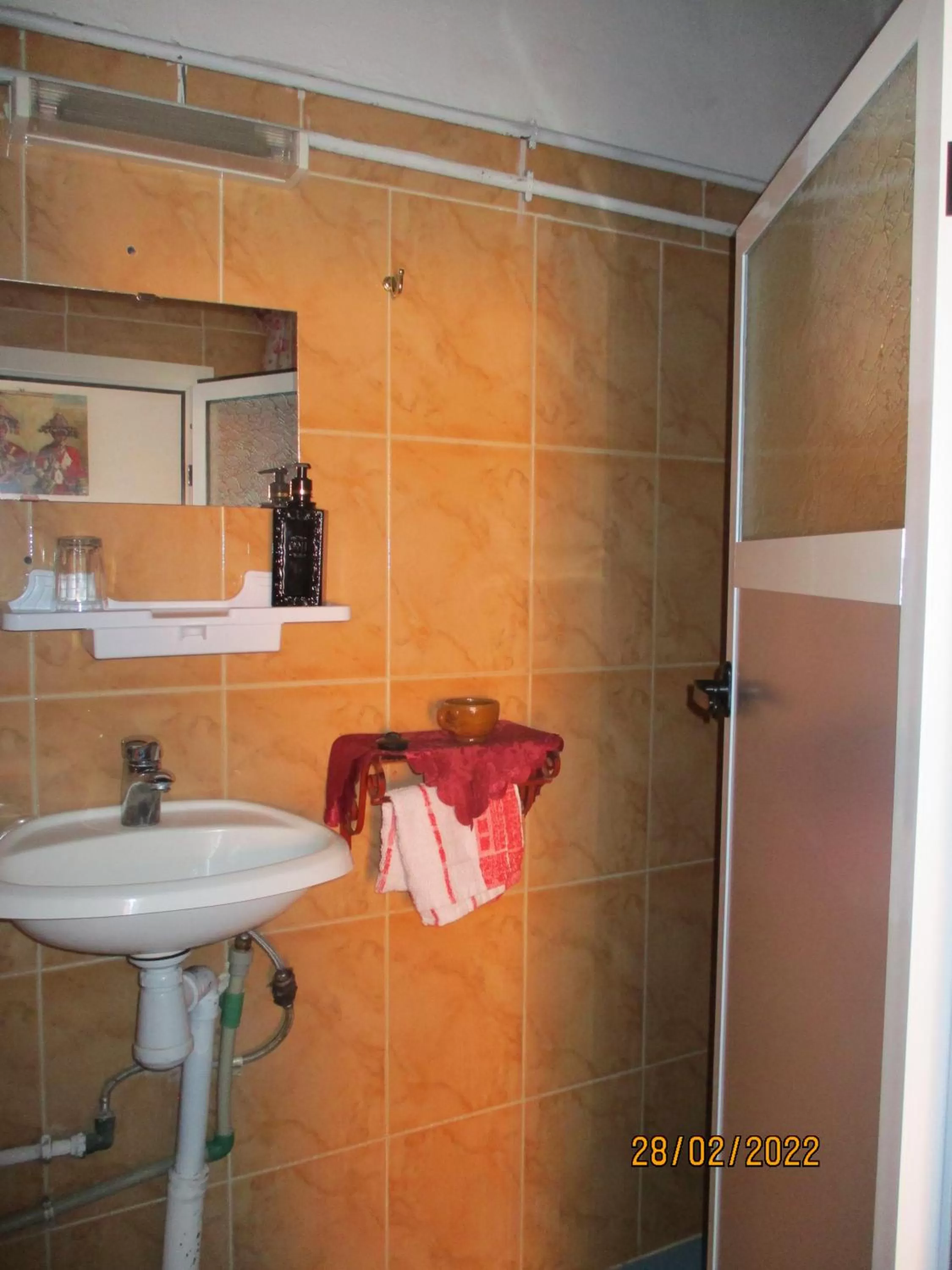 Bathroom in Maison d'hôtes Retour Au Calme