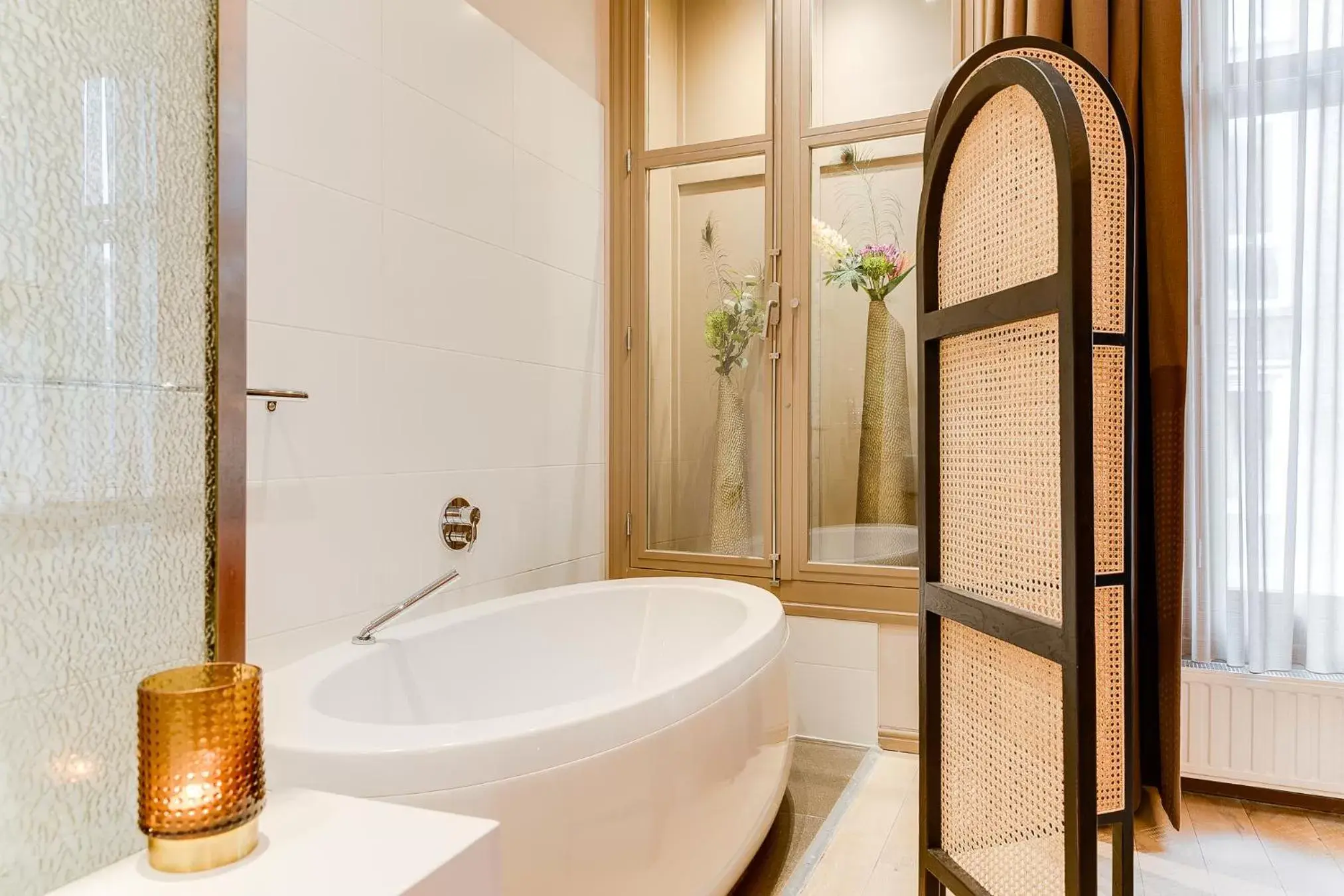 Bathroom in Brasss Hotel Suites