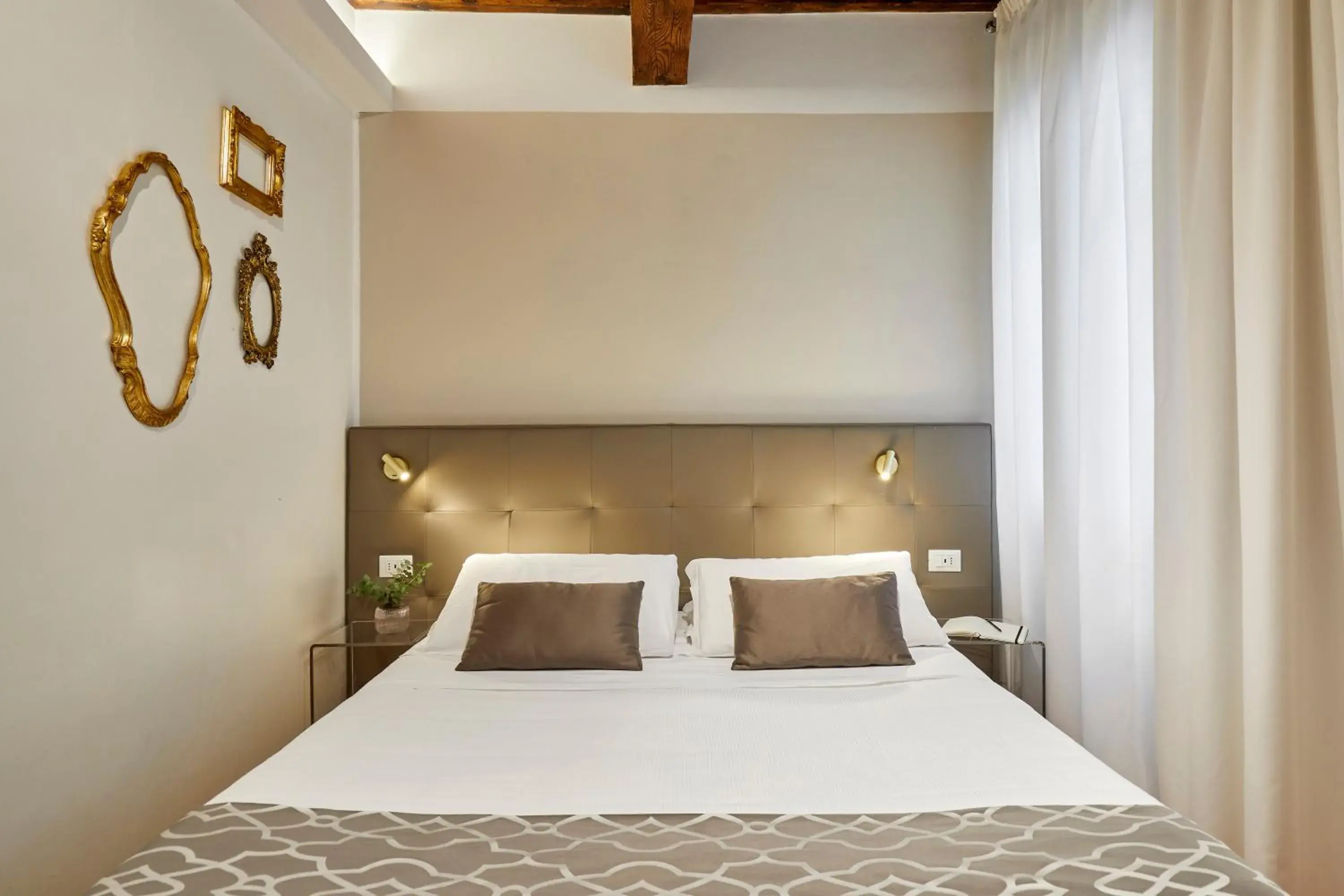 Bed in Sette Angeli Rooms