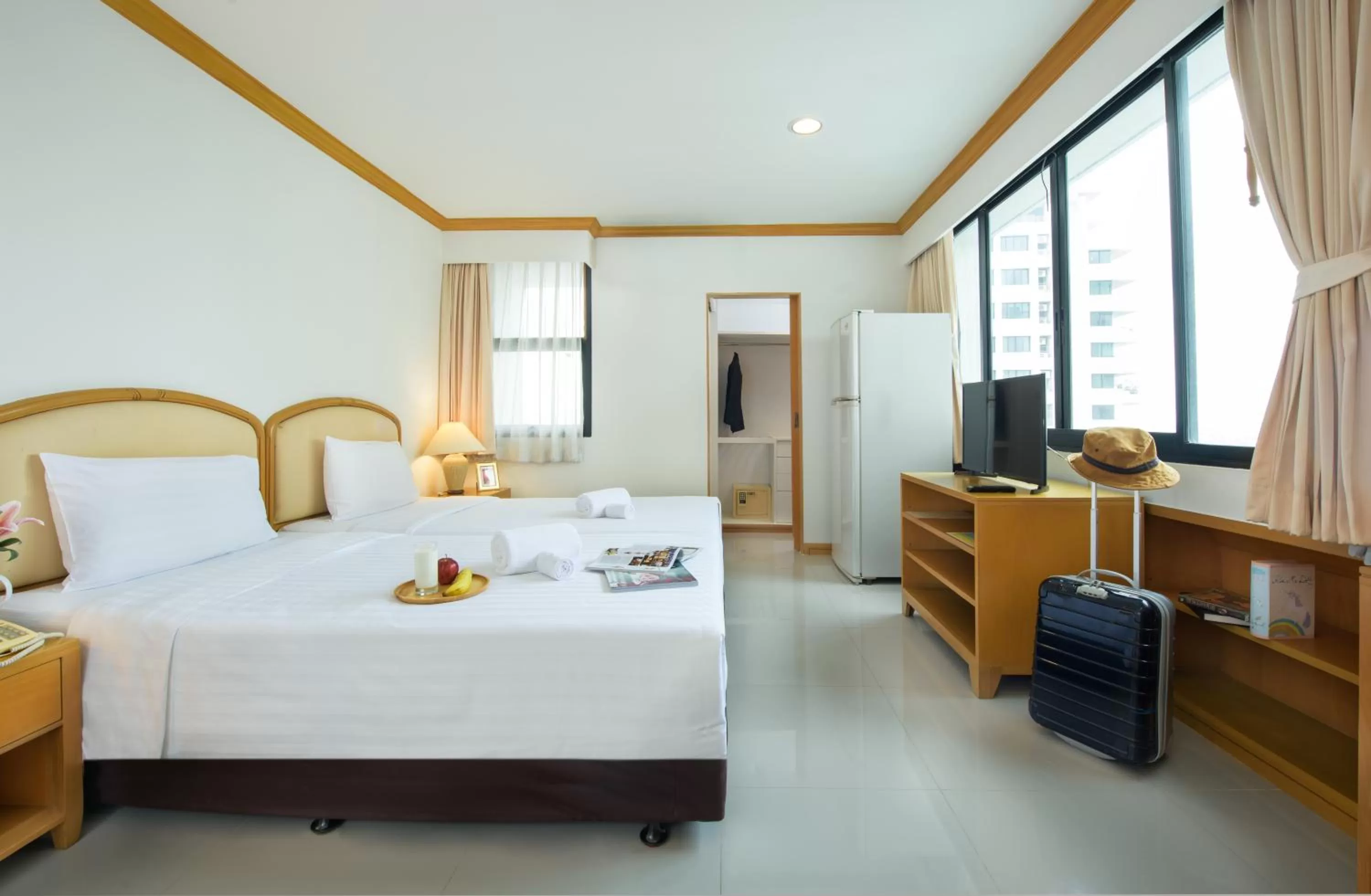 Bed in Riverine Place Hotel and Residence