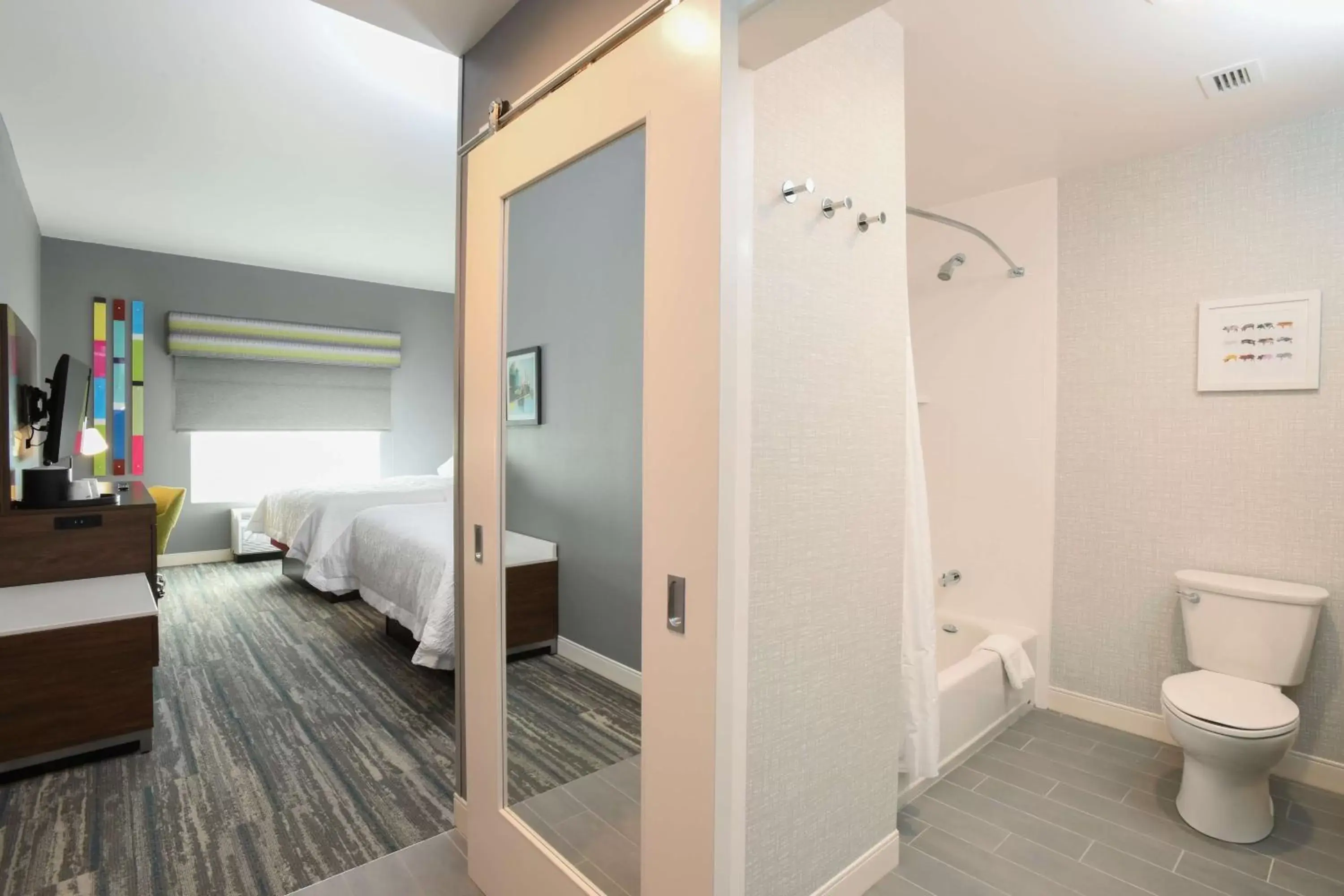 Bedroom, Bathroom in Hampton Inn & Suites Cincinnati Liberty Township